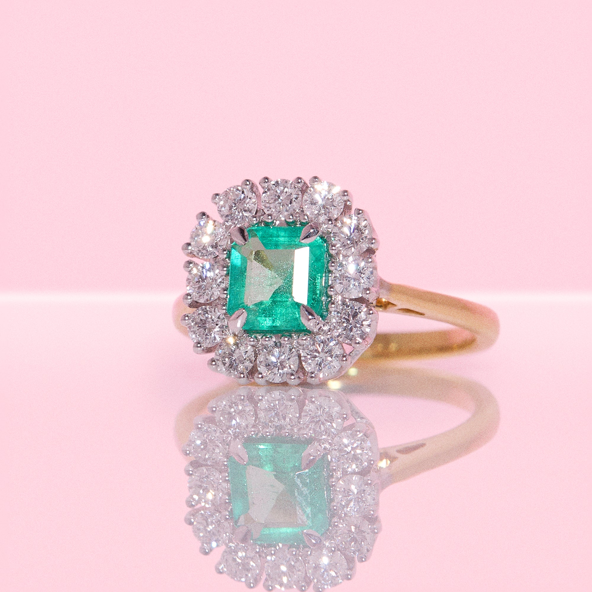 18ct gold emerald and diamond cluster ring