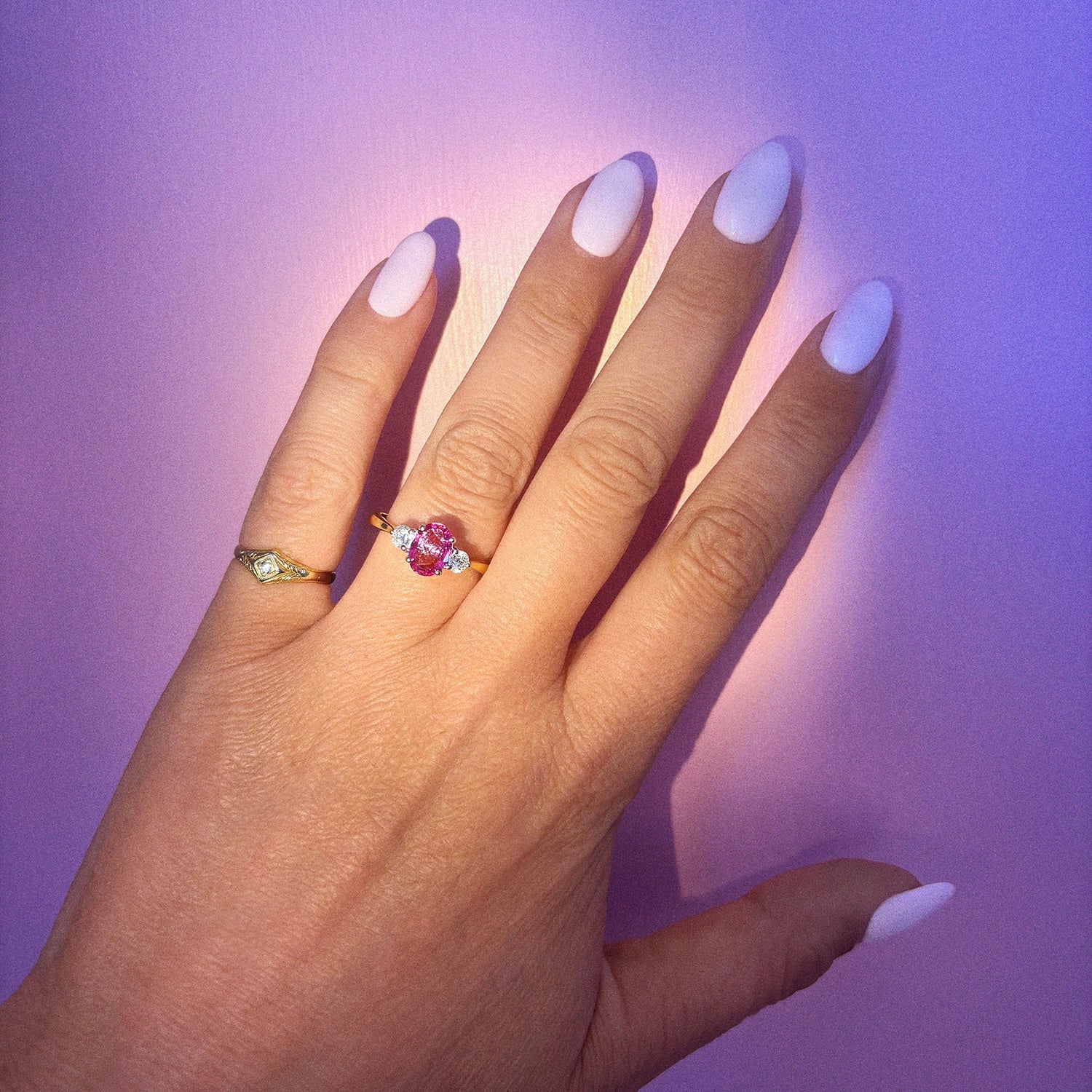 18ct gold 1.22ct pink sapphire and 0.25ct diamond three stone ring