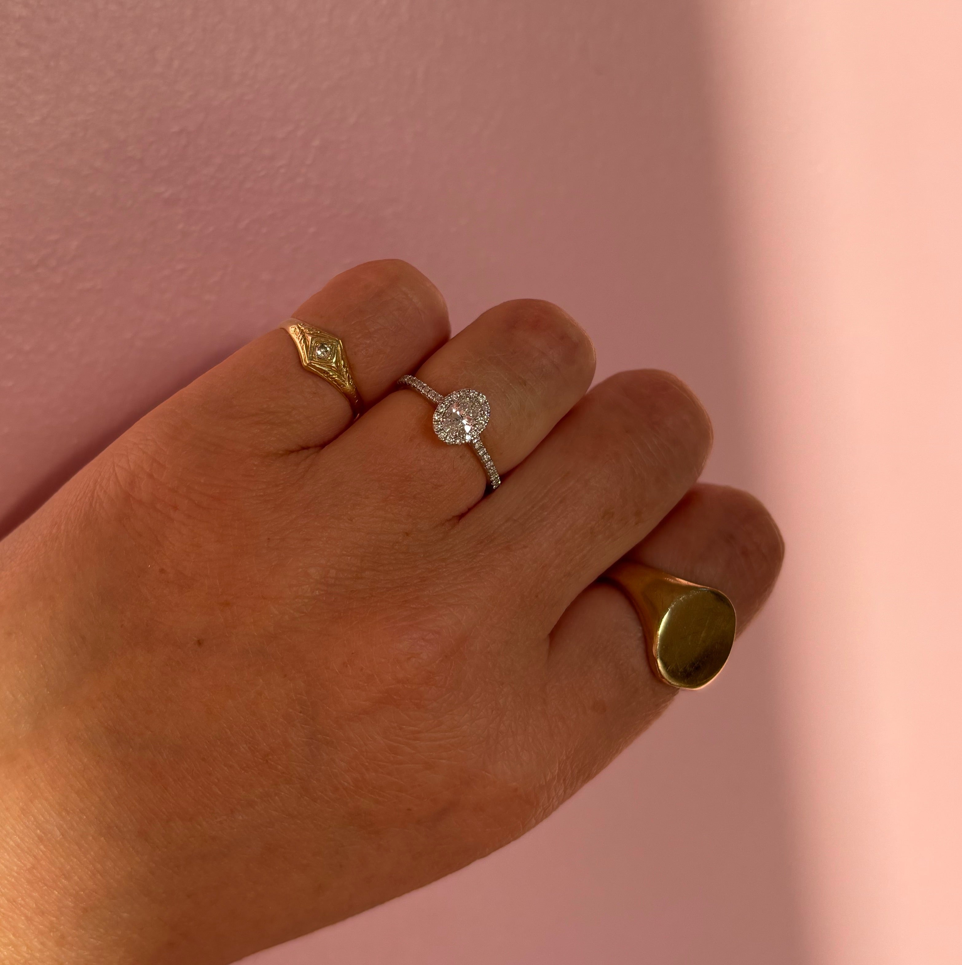 18ct white gold 0.50ct oval half-eternity diamond ring