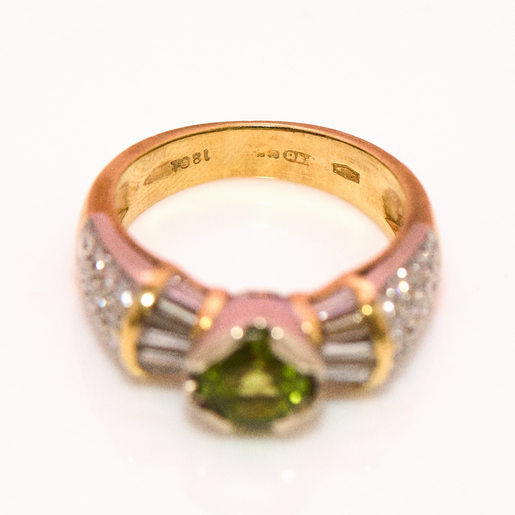 18ct gold peridot and baguette diamond ring