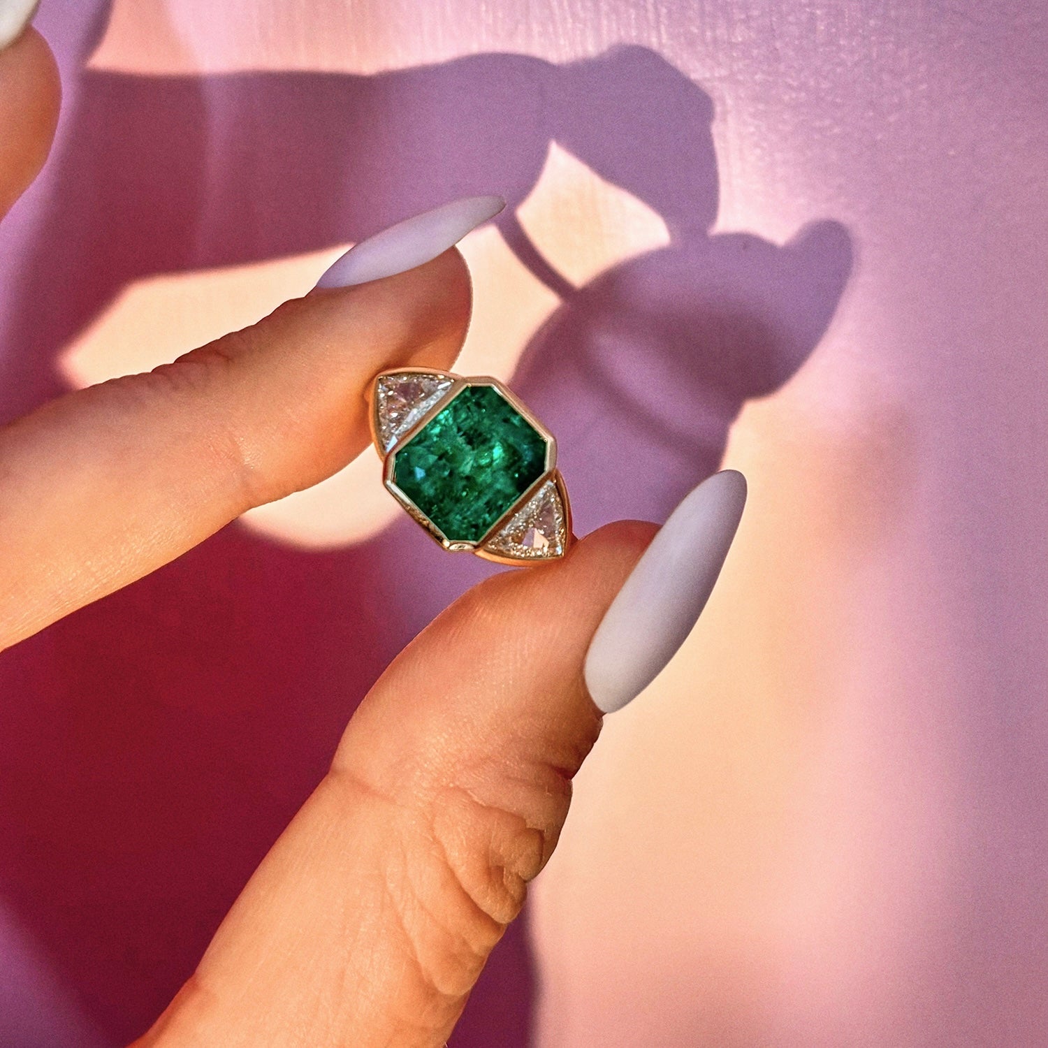 18ct gold 3.0ct Columbian Octagonal-cut emerald and 1.0ct diamond bezel set ring