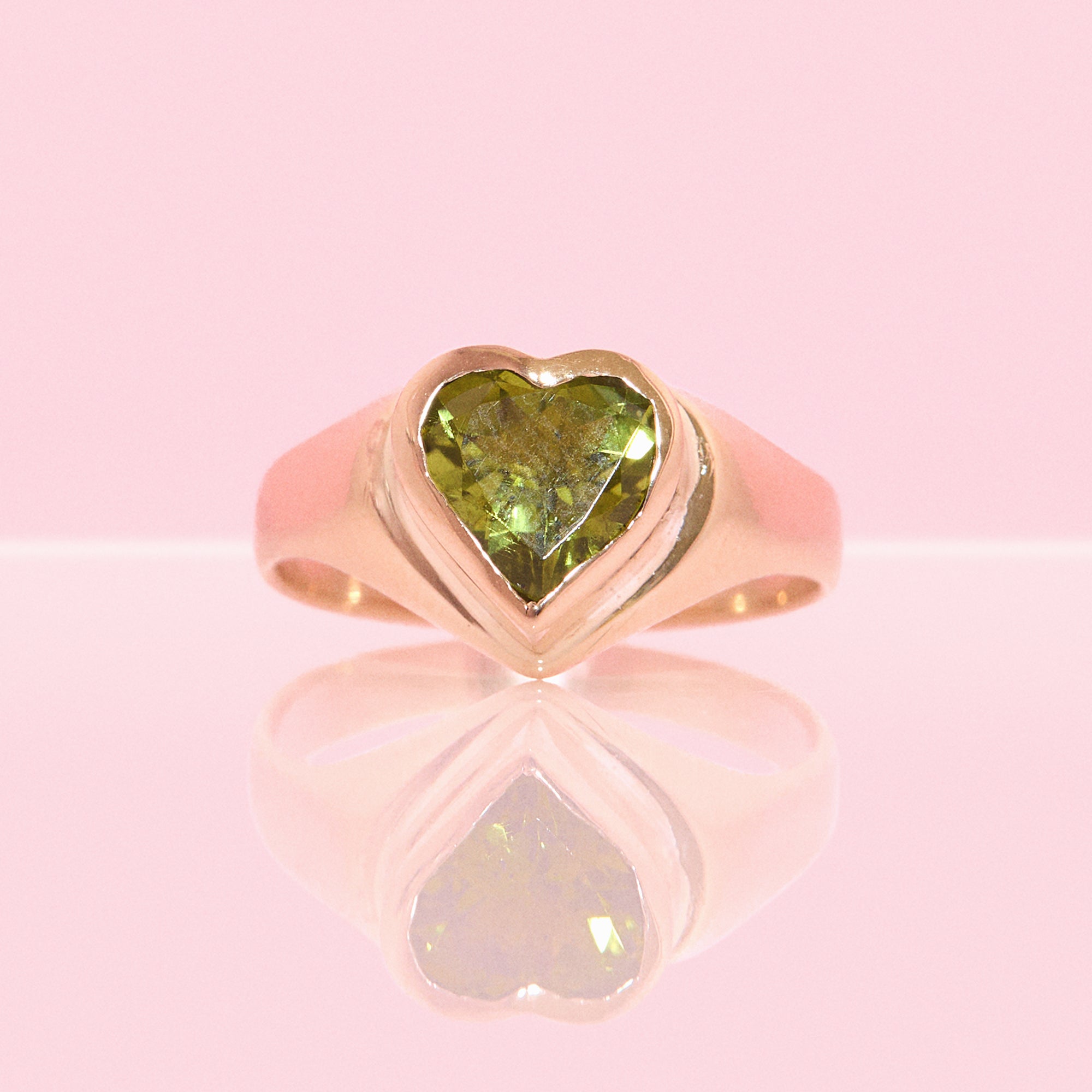 9ct gold bezel set heart shaped peridot signet ring