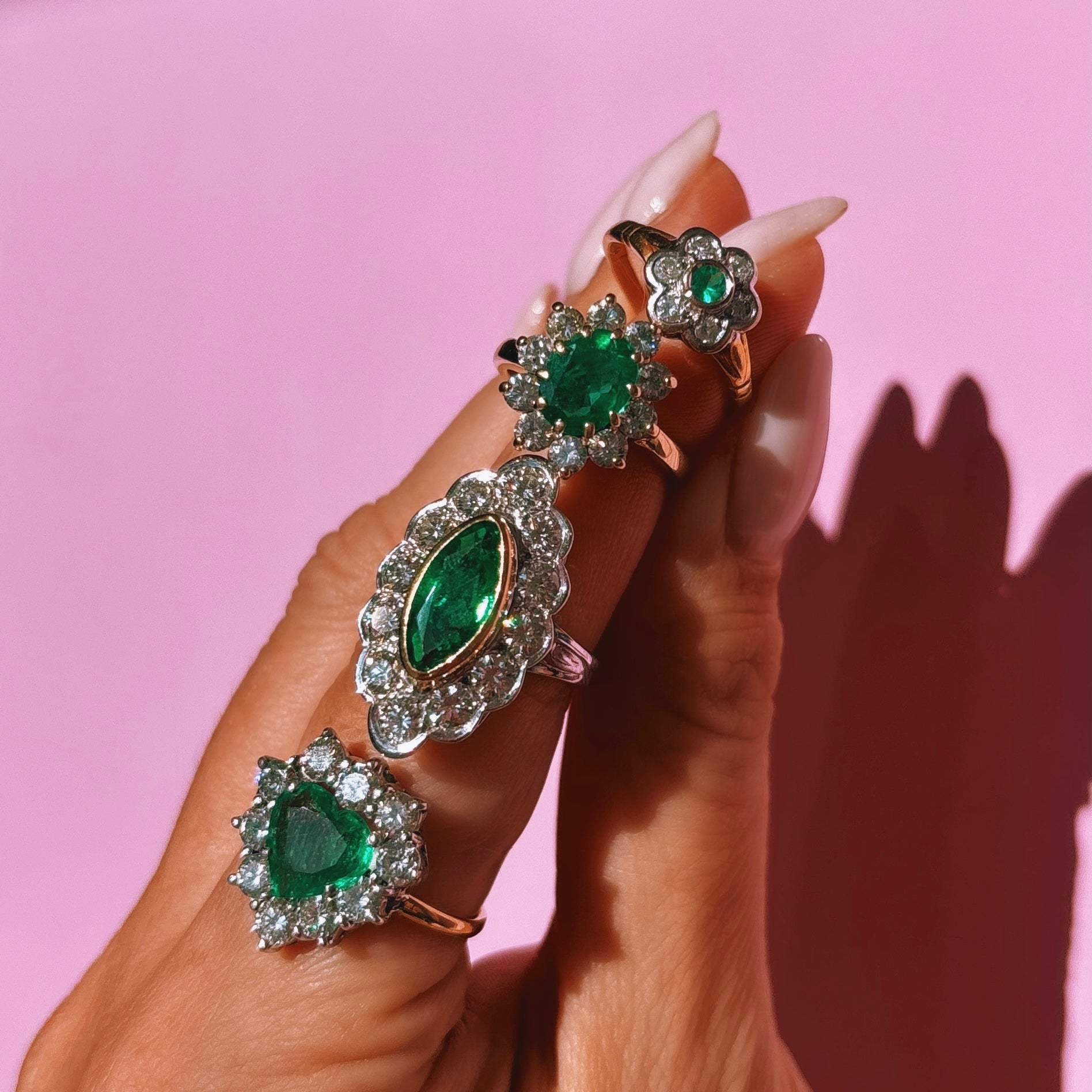 18ct white gold bezel set marquise emerald and diamond ring