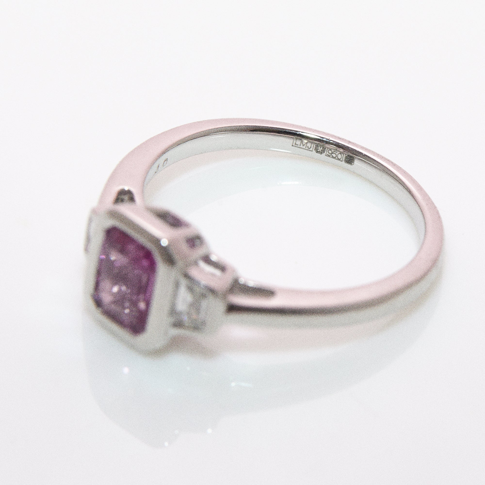 Platinum 0.95ct emerald cut pink sapphire and diamond bezel set ring