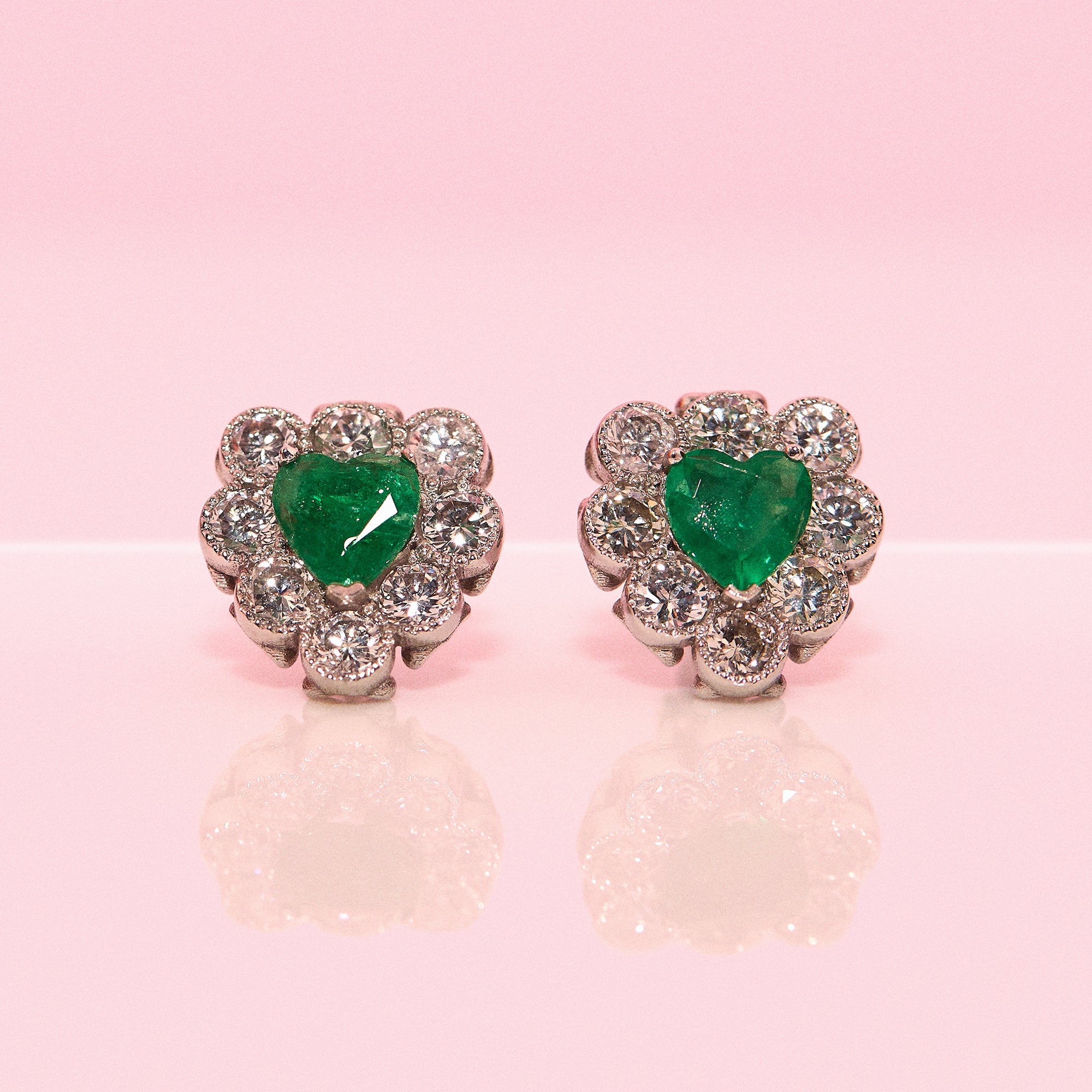 Platinum heart-shaped ruby and diamond vintage earring conversion ring