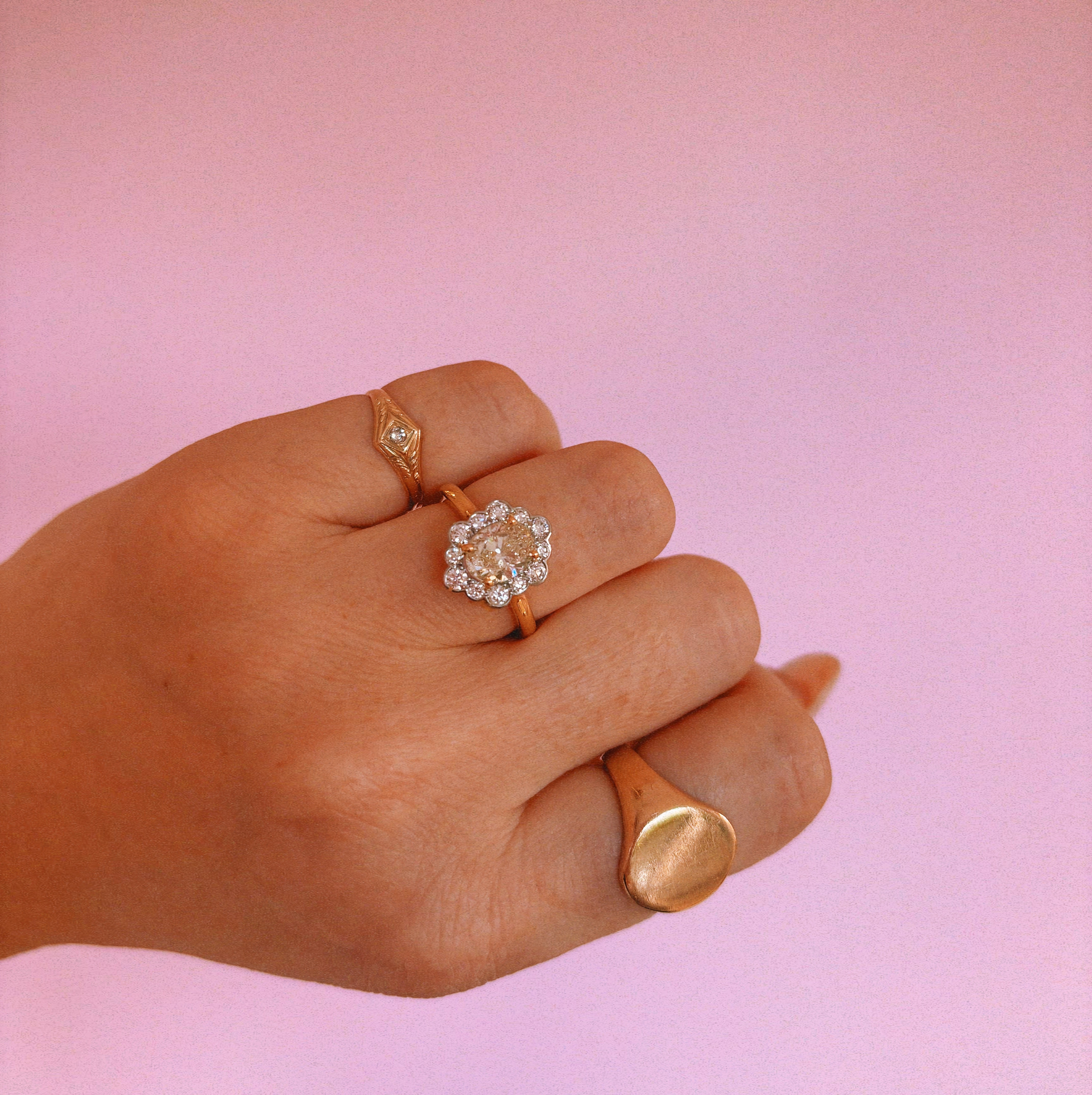18ct gold 1.20ct oval diamond flower ring