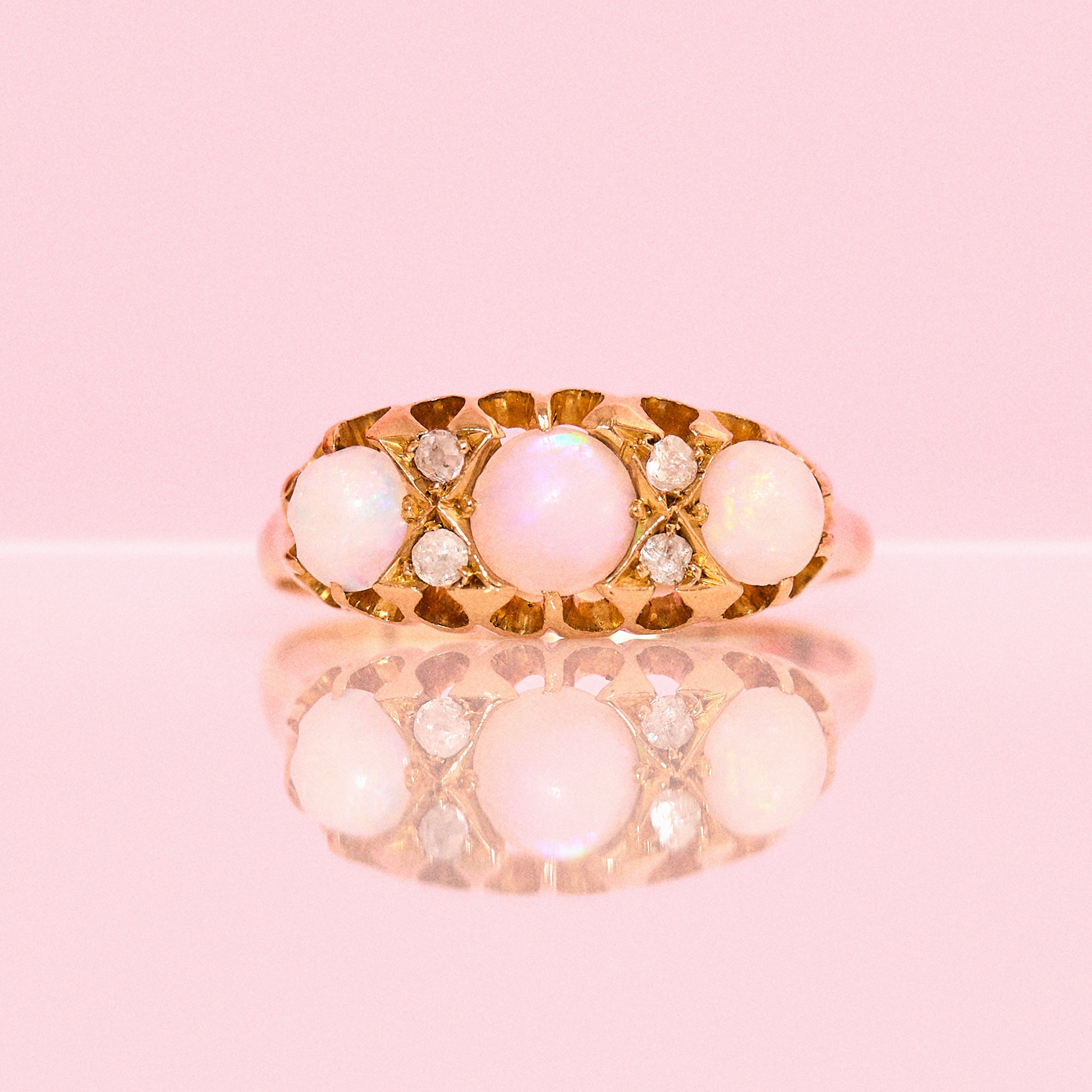 18ct gold opal and diamond seven stone ring