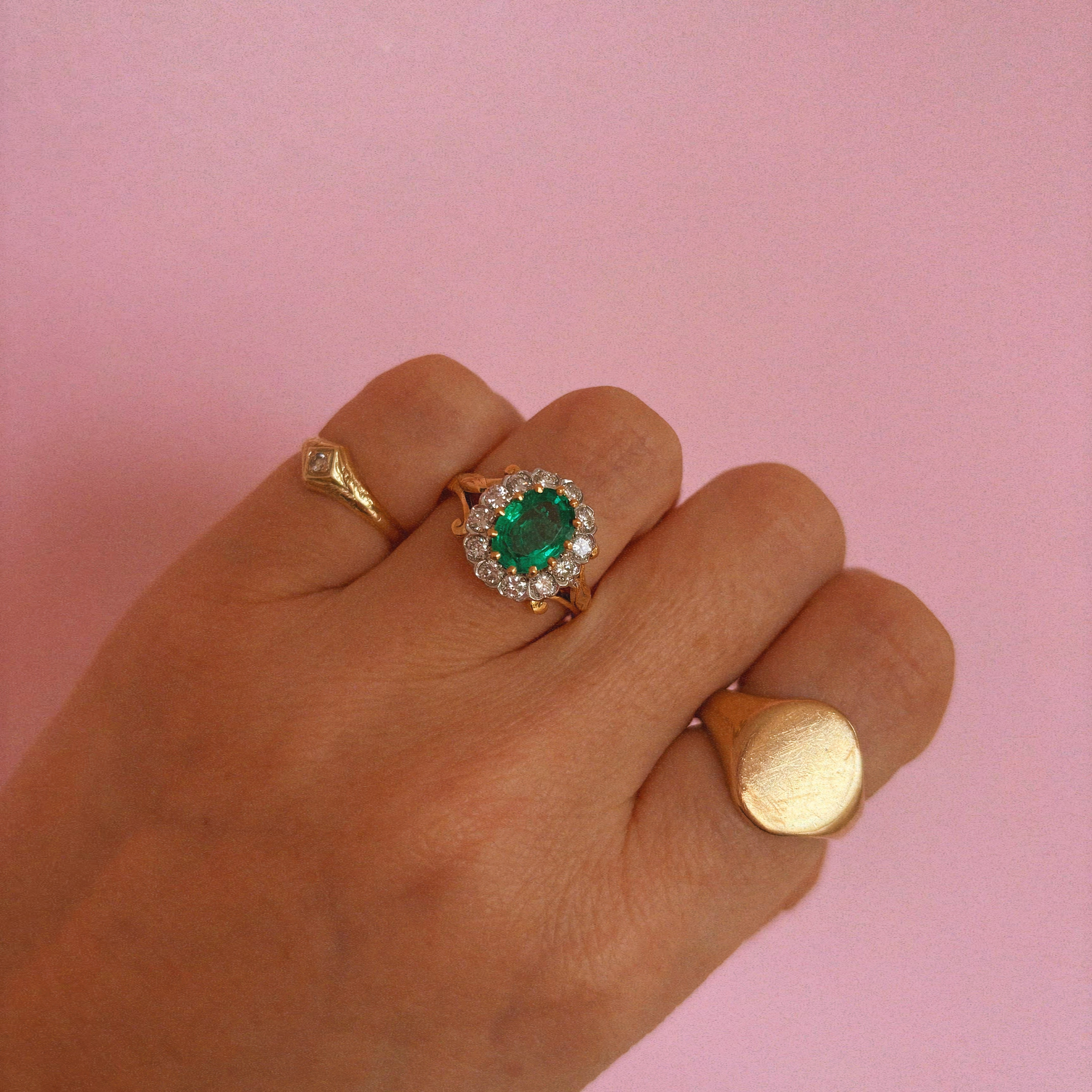 18ct gold 1.46ct emerald and diamond cluster ring