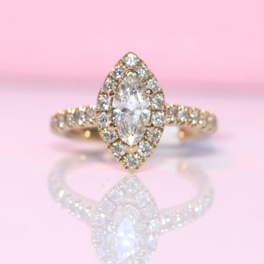 18ct gold 0.85ct marquise cut diamond halo ring