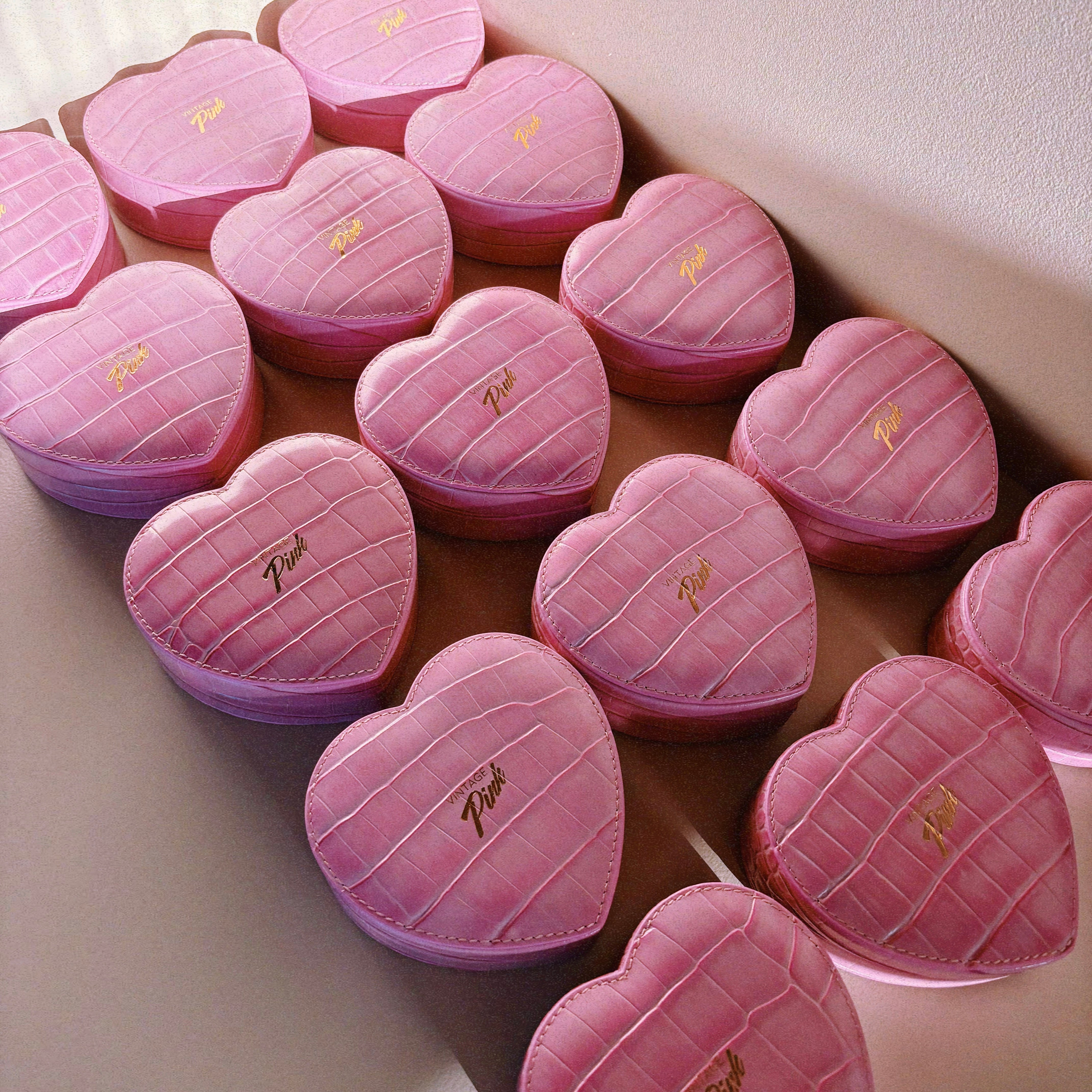 Heart-shaped pink faux croc and red velvet jewellery box
