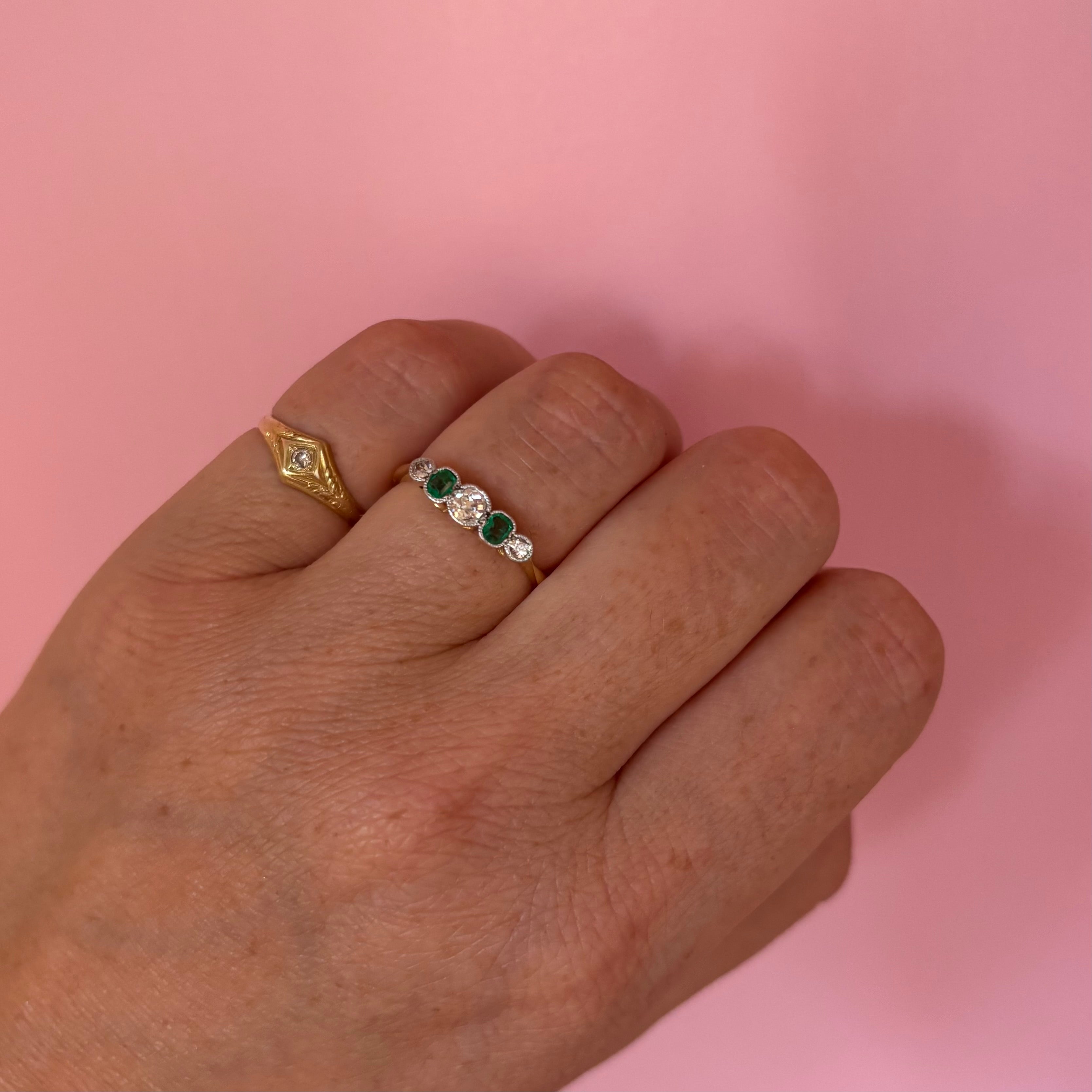 18ct gold Colombian emerald and old cut diamond half eternity ring
