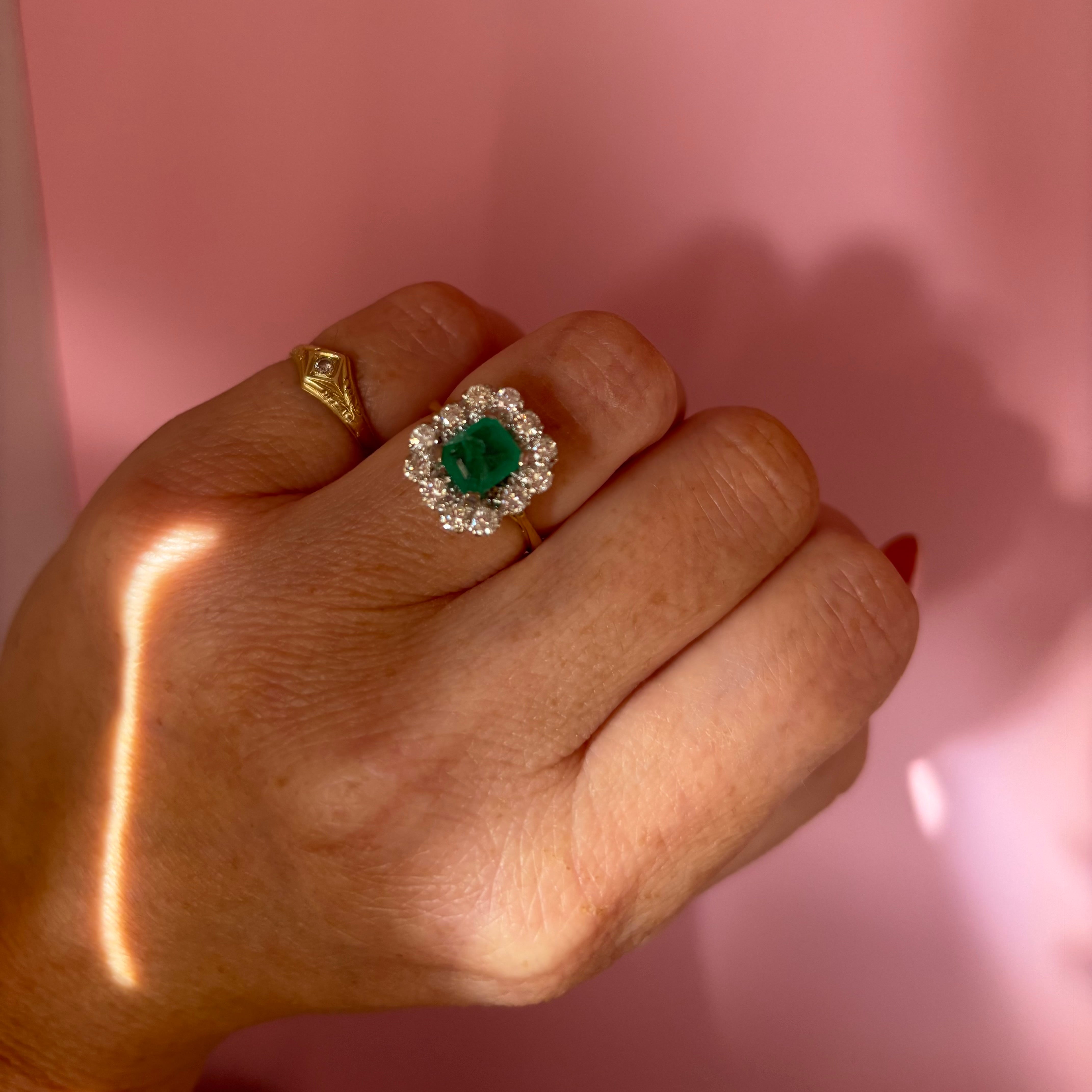 18ct gold emerald and diamond cluster ring