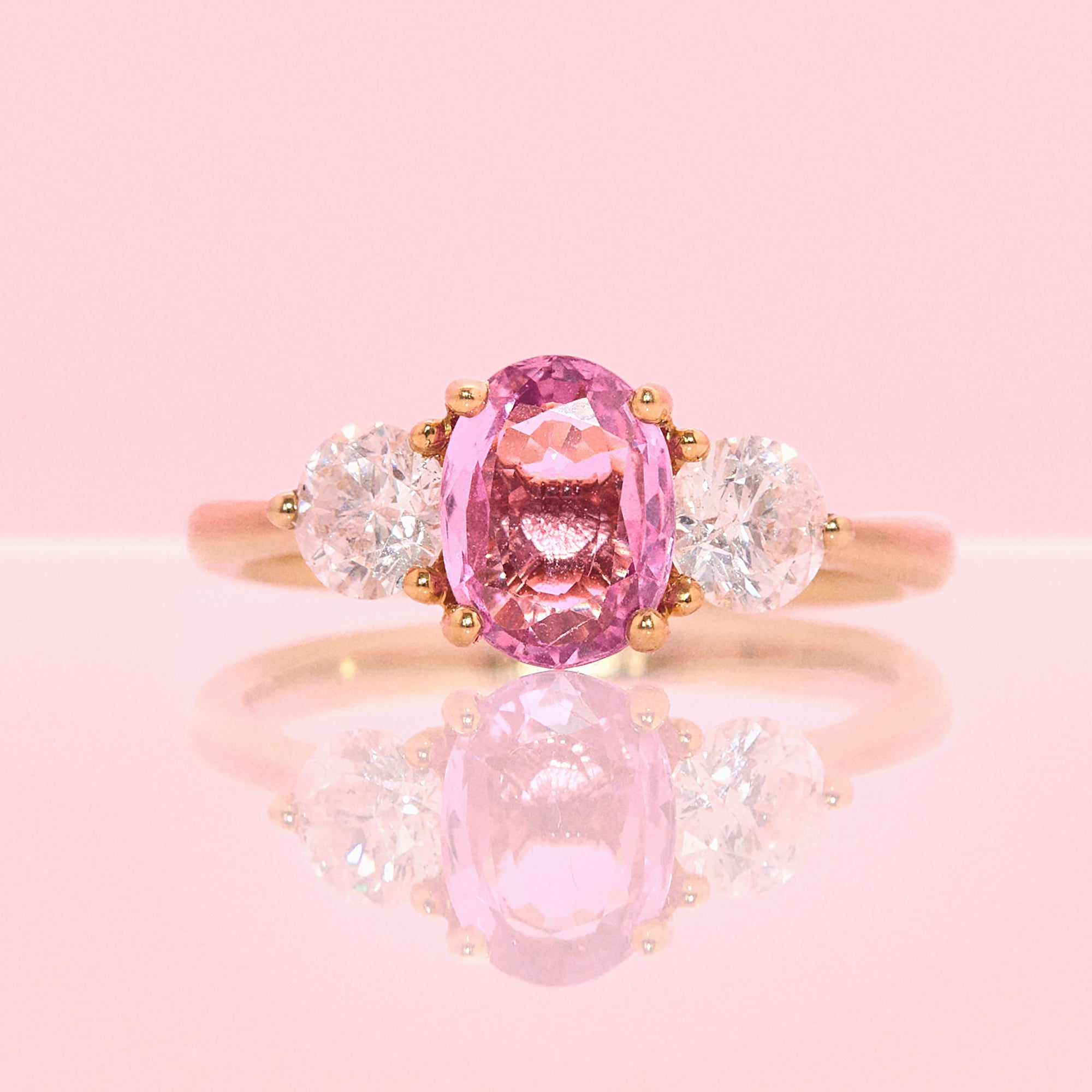 18ct gold 1.46ct pink sapphire and 0.84ct diamond three stone ring (made to order)