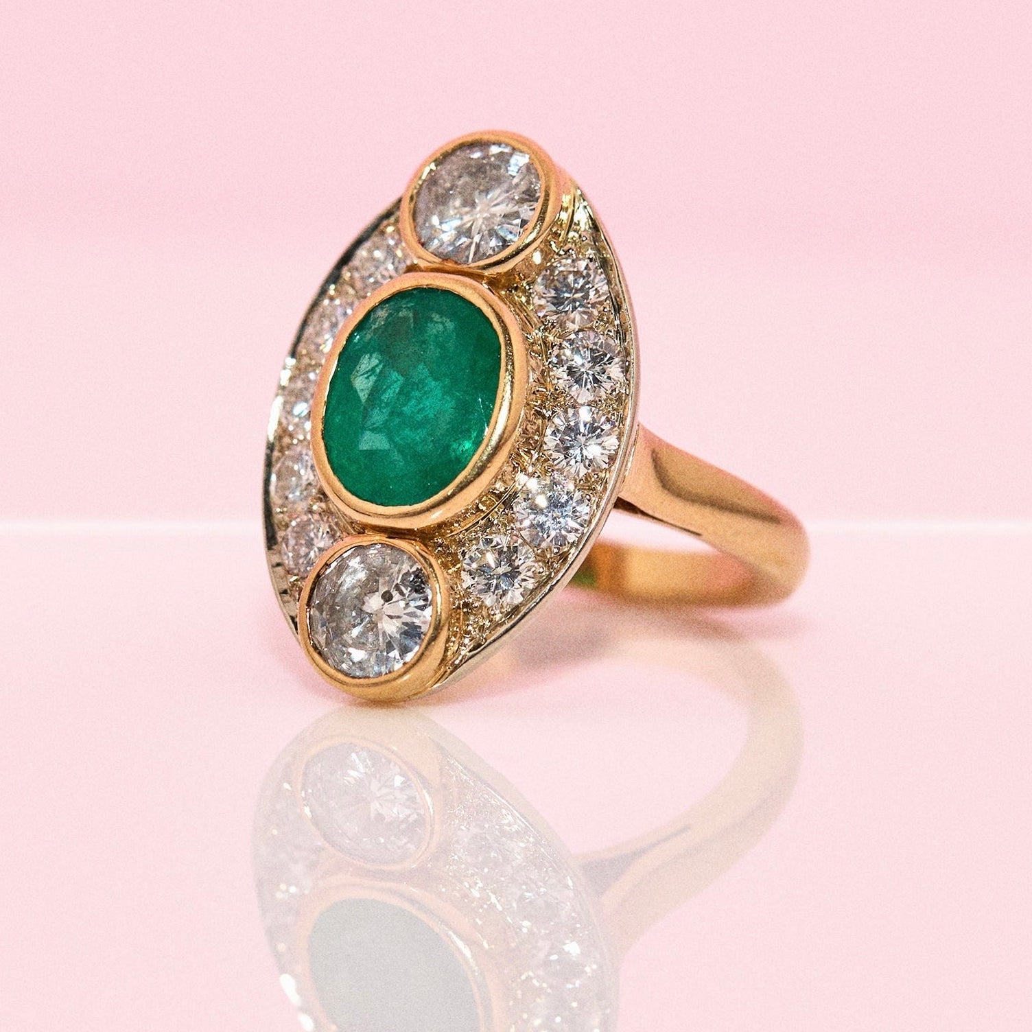 Vintage 18ct gold 2.9ct emerald and 2.5ct diamond french ring