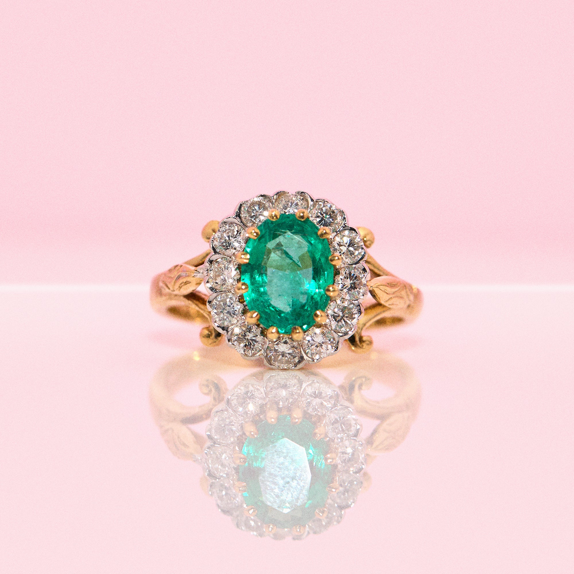 18ct gold 1.46ct emerald and diamond cluster ring