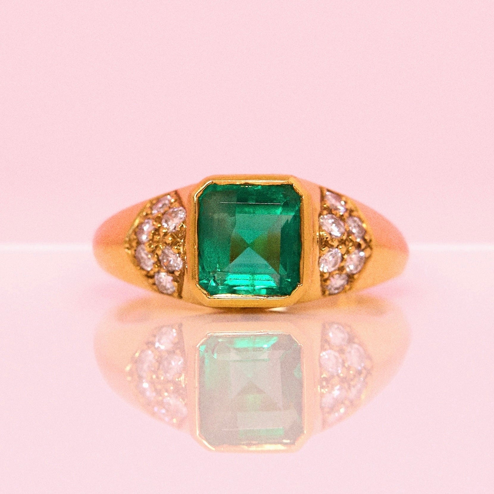 18ct gold emerald and diamond ring