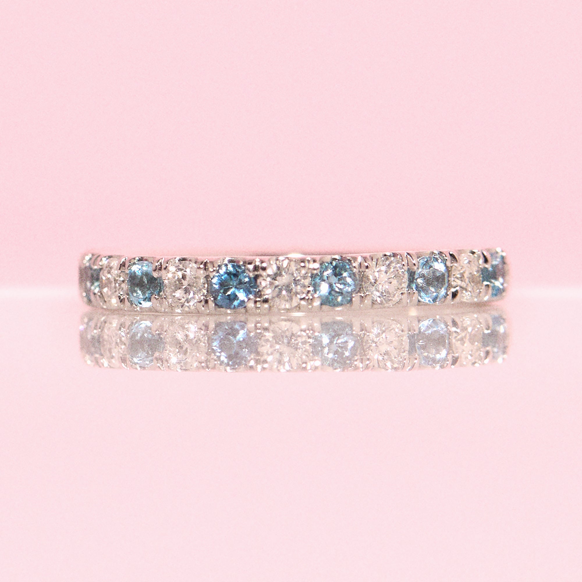 Platinum diamond and aquamarine half-eternity ring (made to order)