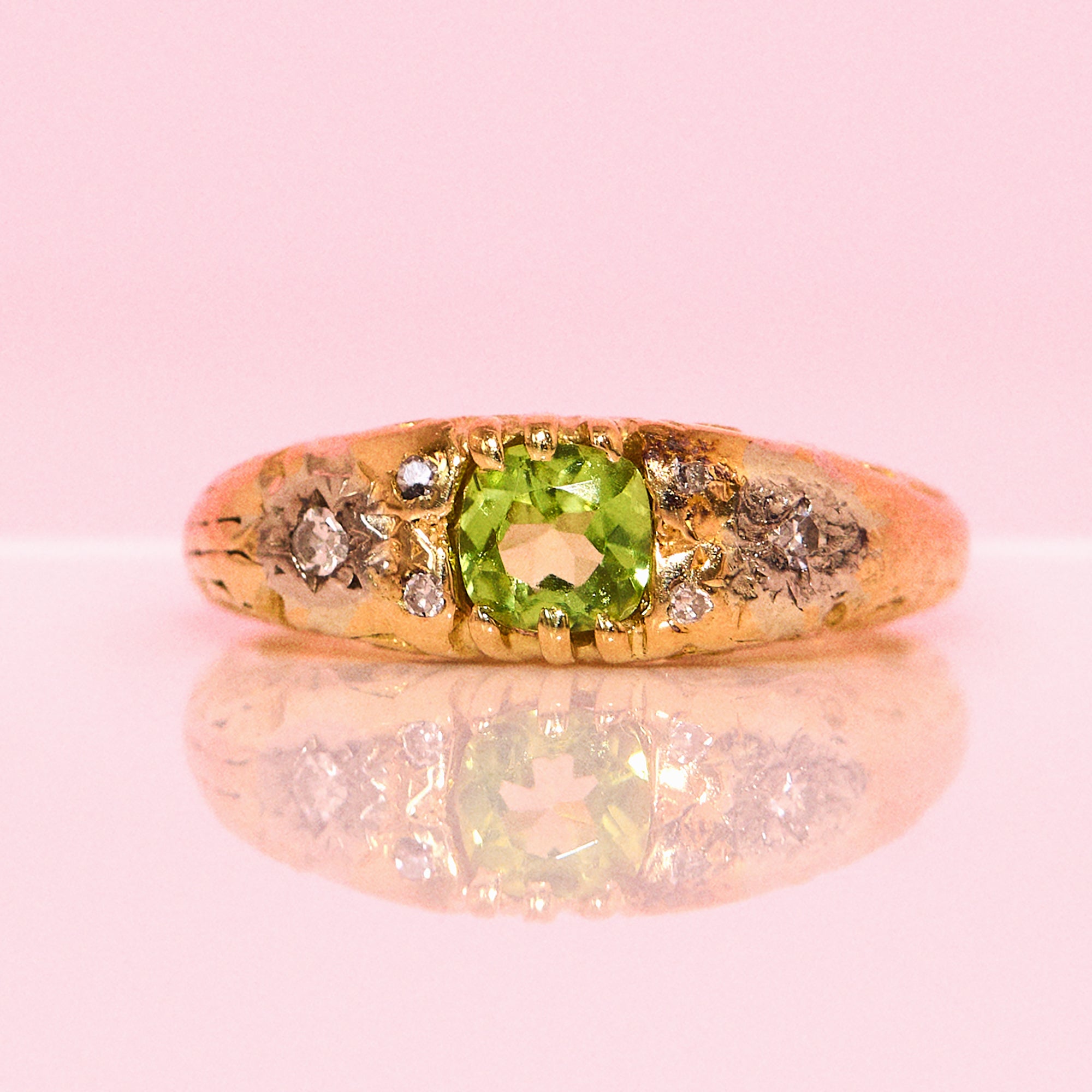 18ct gold peridot and diamond carved ring from 1966