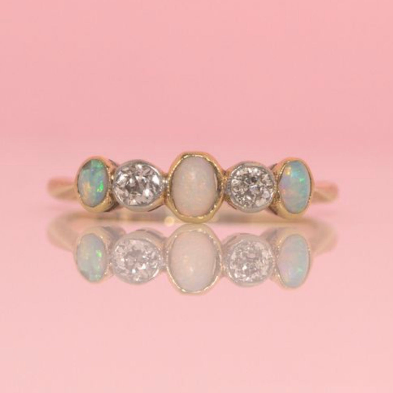 18ct gold art deco bezel set opal and diamond half eternity ring