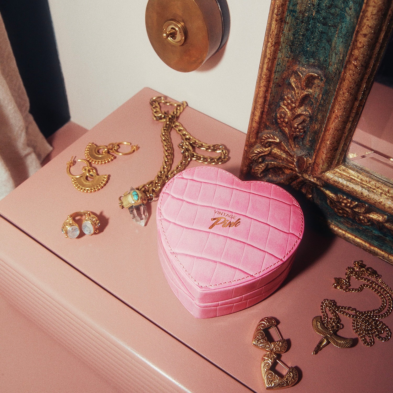 Heart-shaped pink faux croc and red velvet jewellery box