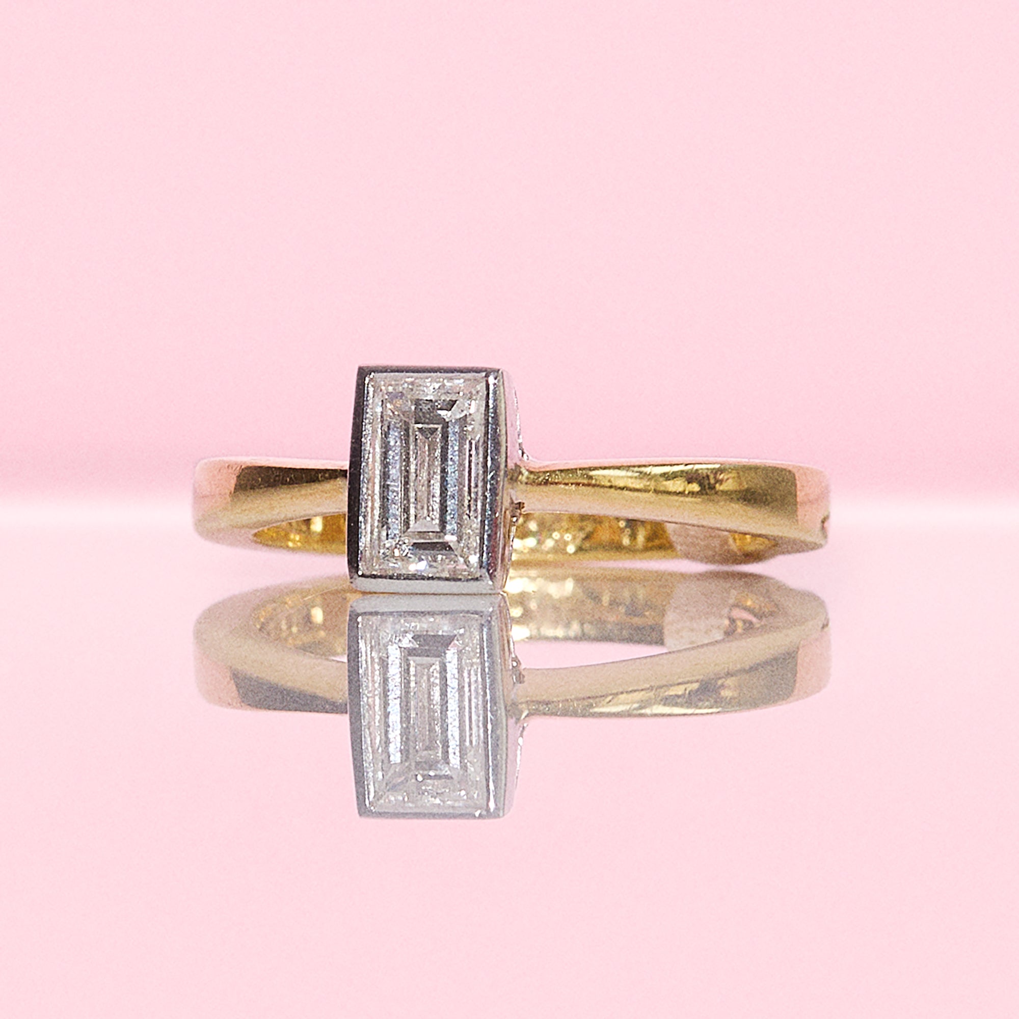 18ct gold 0.71ct emerald cut bezel set diamond ring