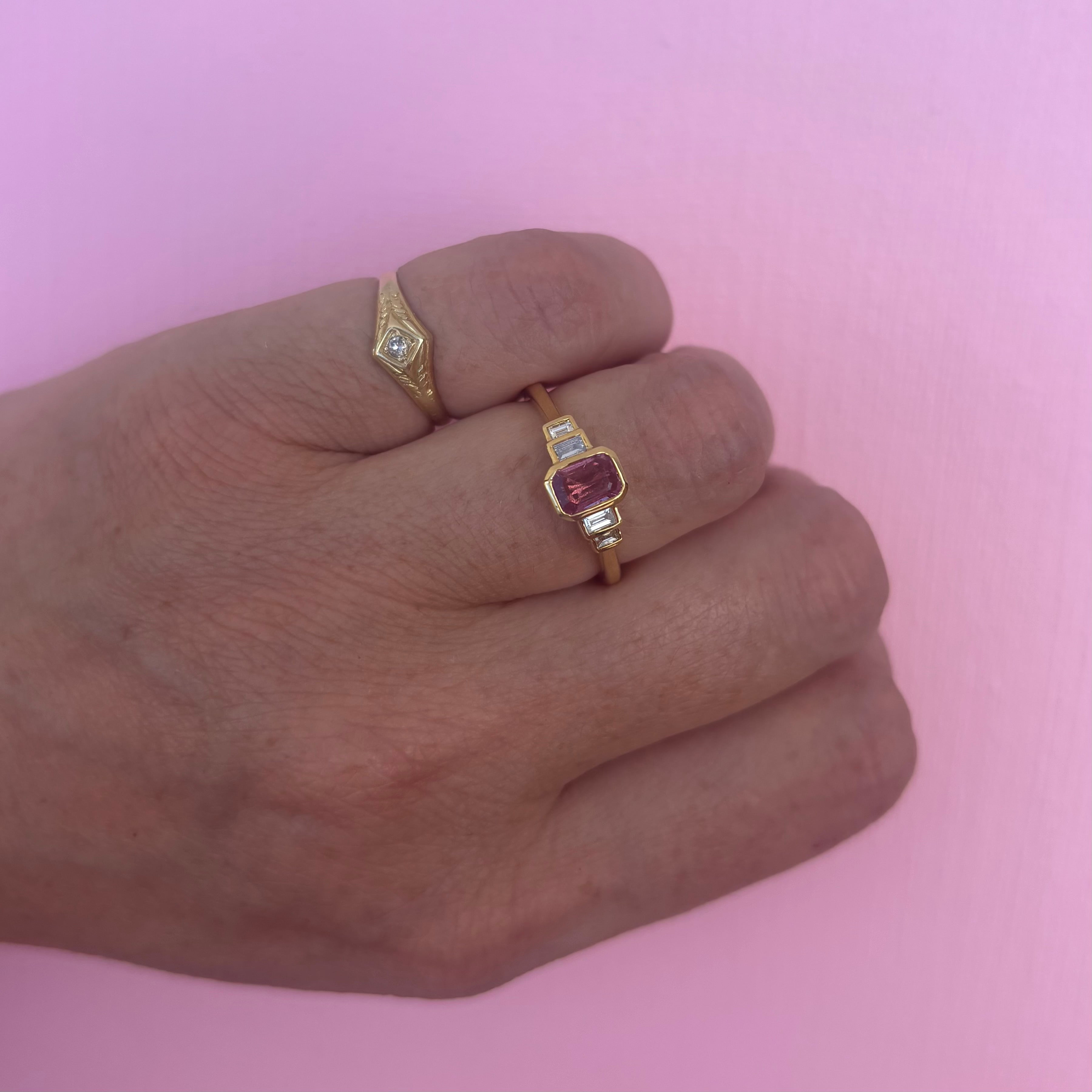 18ct gold 0.72ct emerald cut pink sapphire and 0.13ct diamond ring