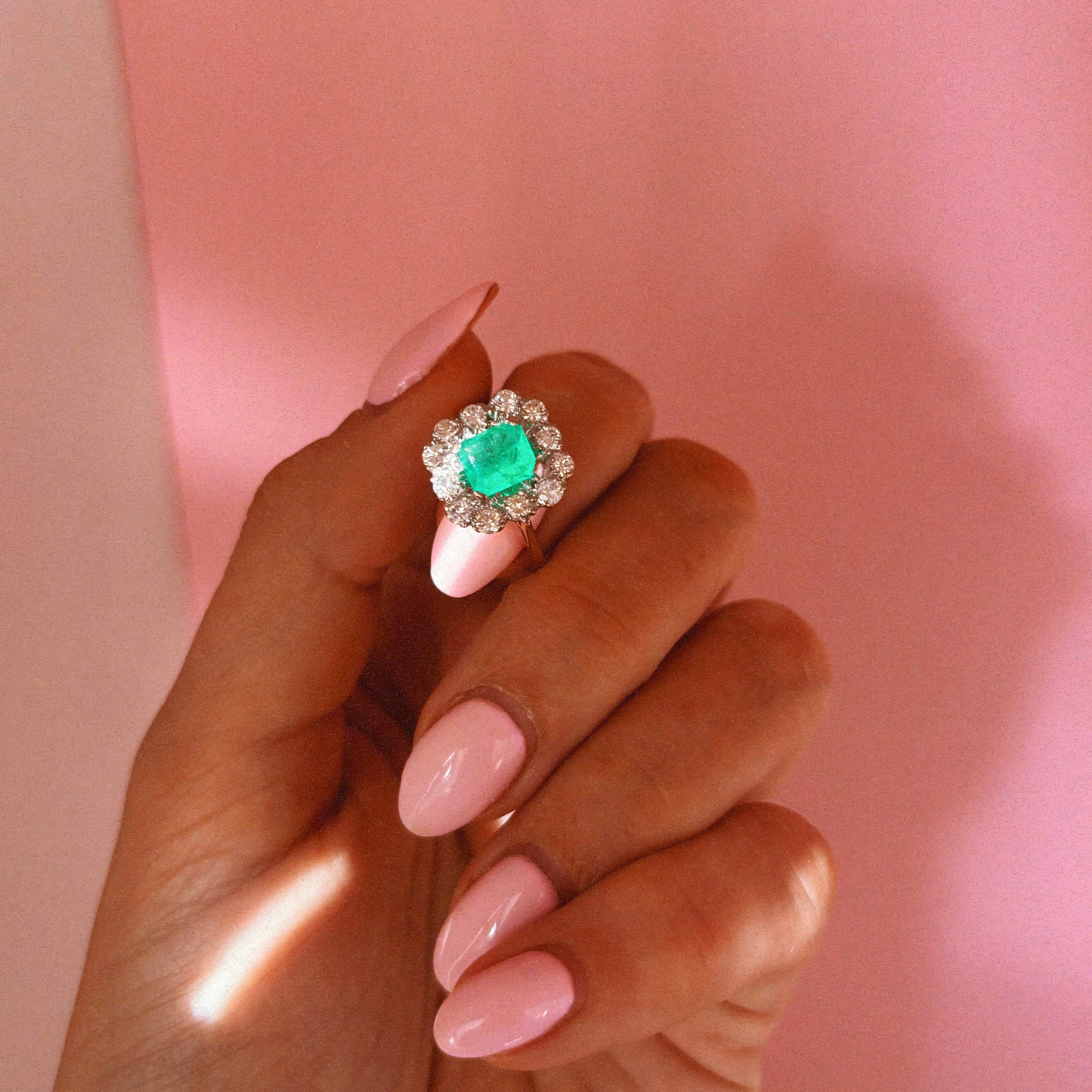 18ct gold emerald and diamond cluster ring