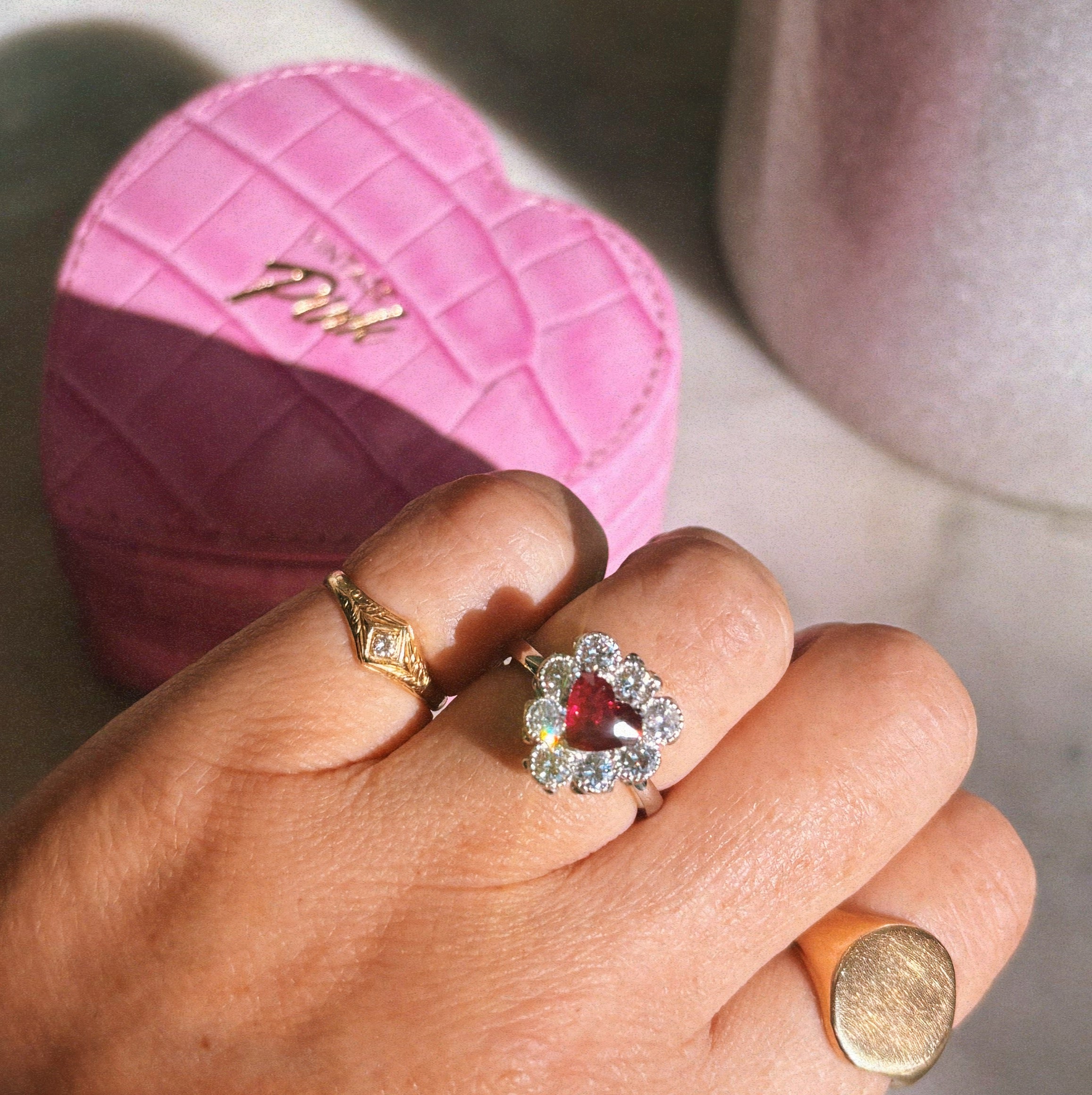 Platinum heart-shaped ruby and diamond vintage earring conversion ring