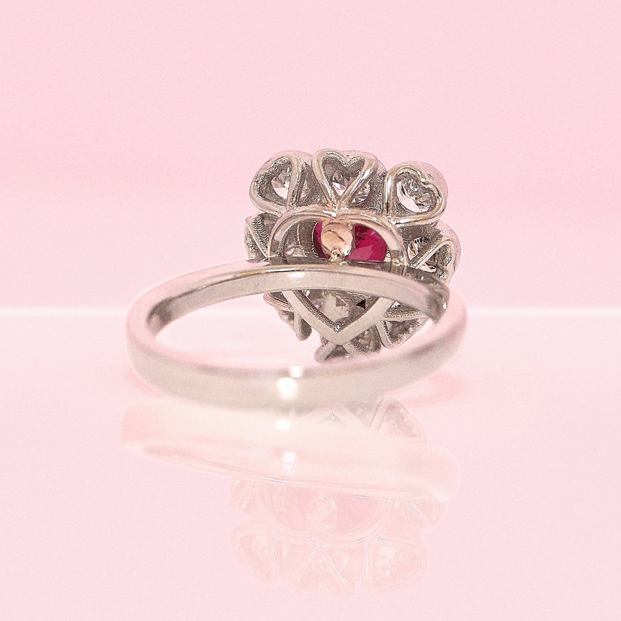 Platinum heart-shaped ruby and diamond vintage earring conversion ring