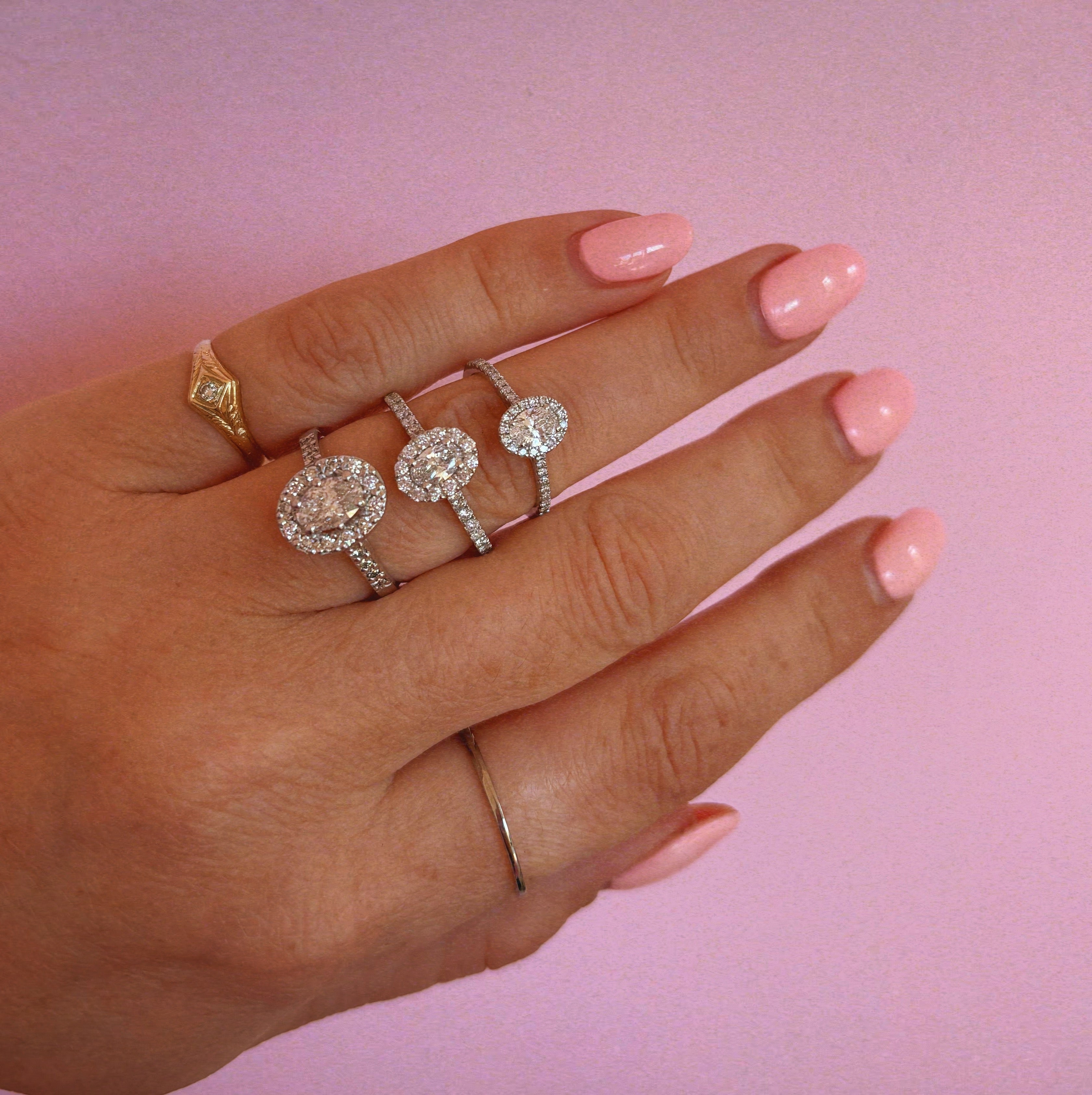 18ct white gold 0.75ct oval diamond cluster half-eternity ring