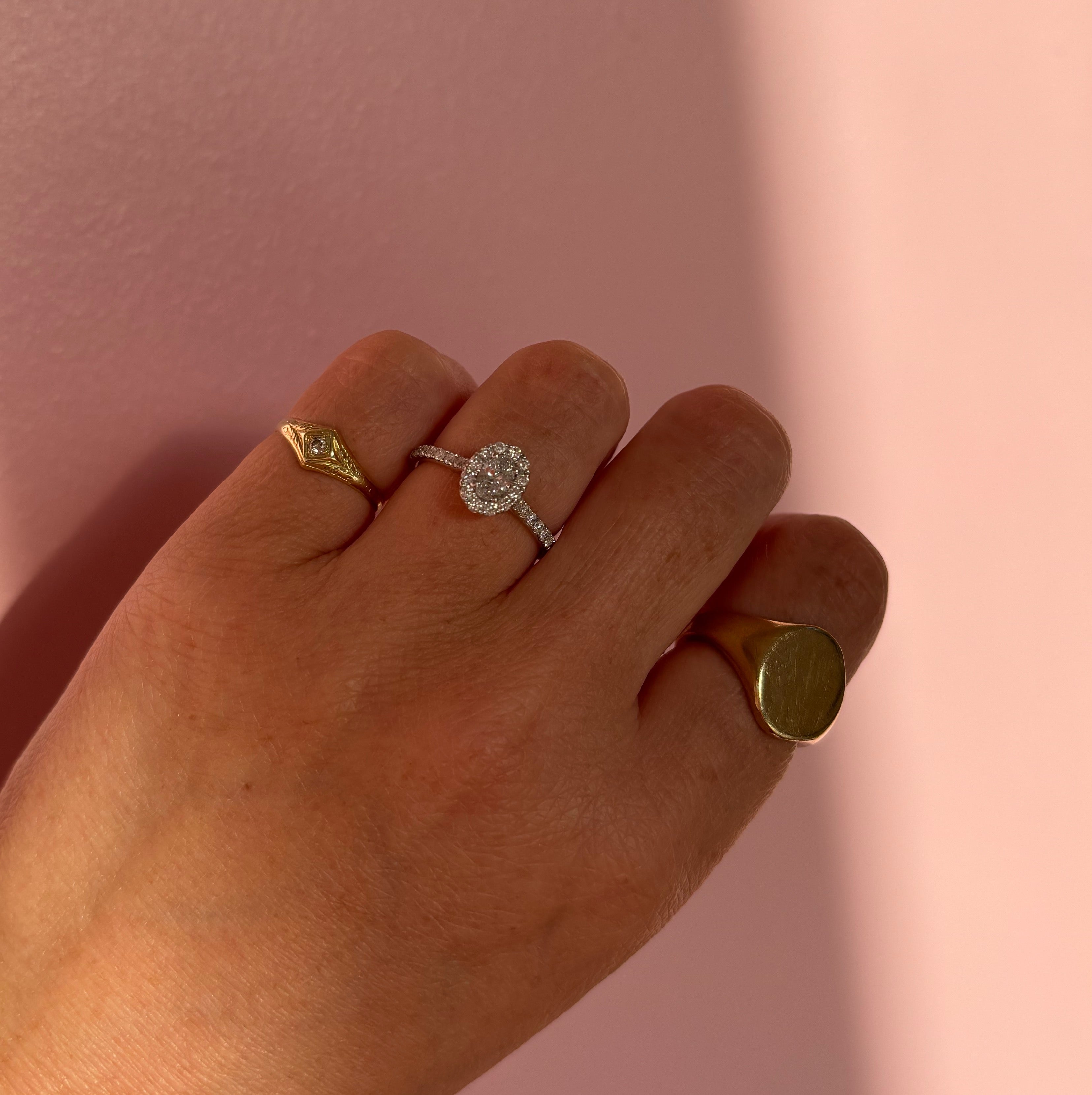 Platinum 0.62ct oval half-eternity diamond ring