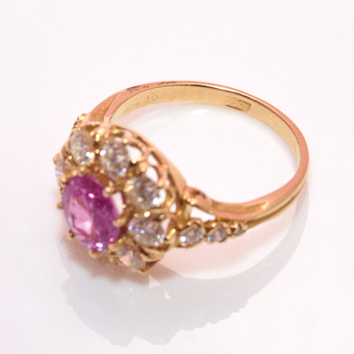 Vintage 18ct gold 1.16ct oval pink sapphire and 1.0ct diamond cluster ring