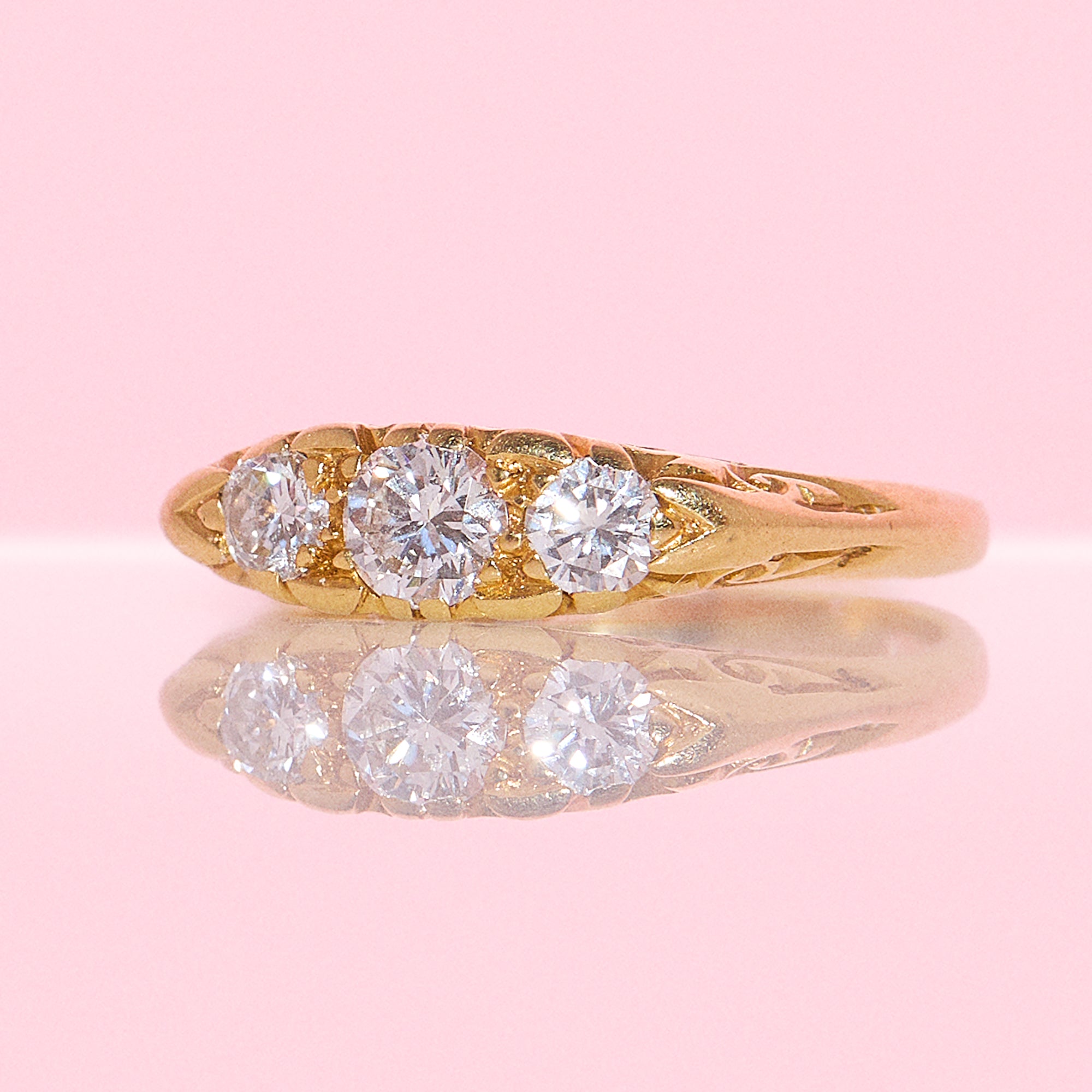 18ct gold diamond three stone carved ring from 1991