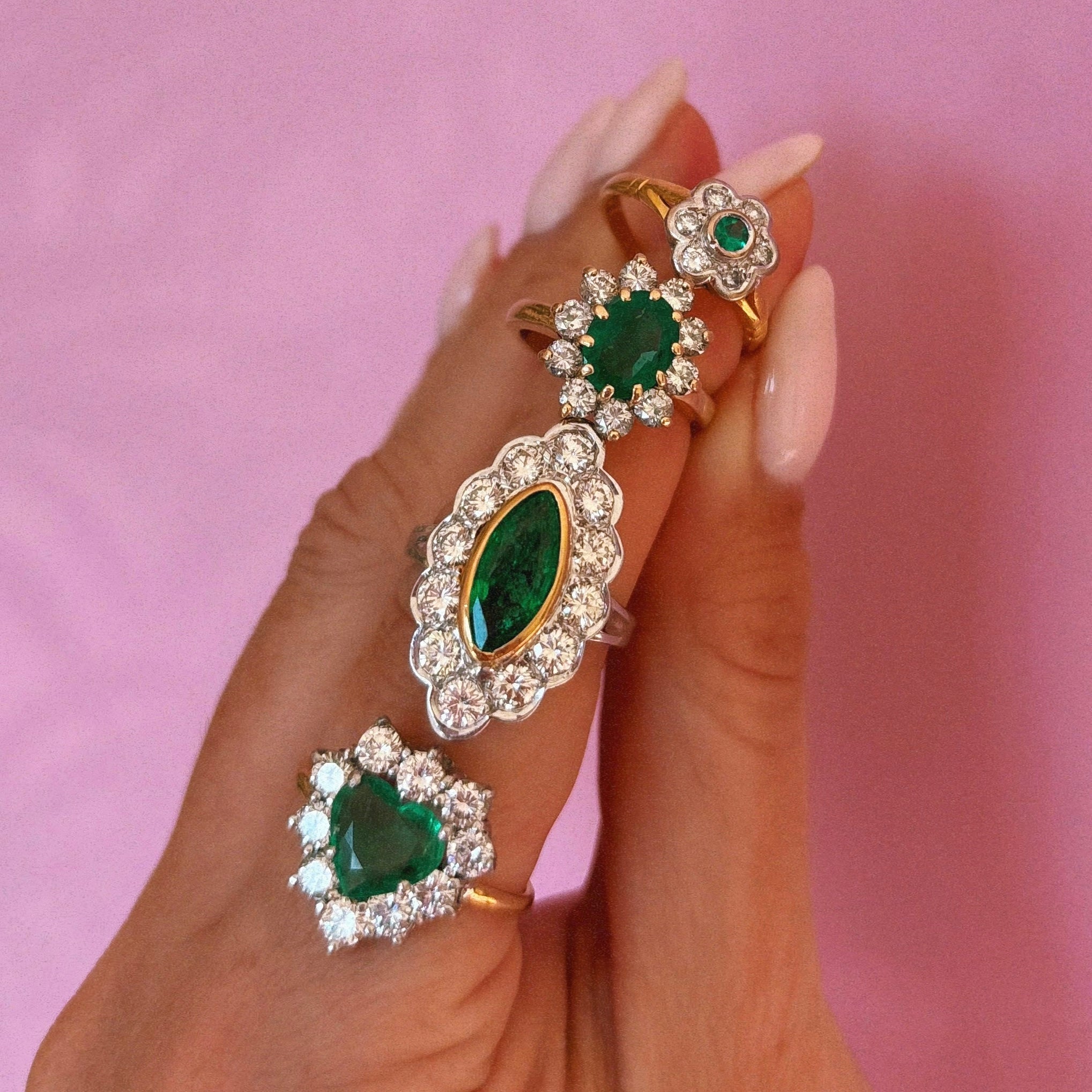 18ct white gold bezel set marquise emerald and diamond ring