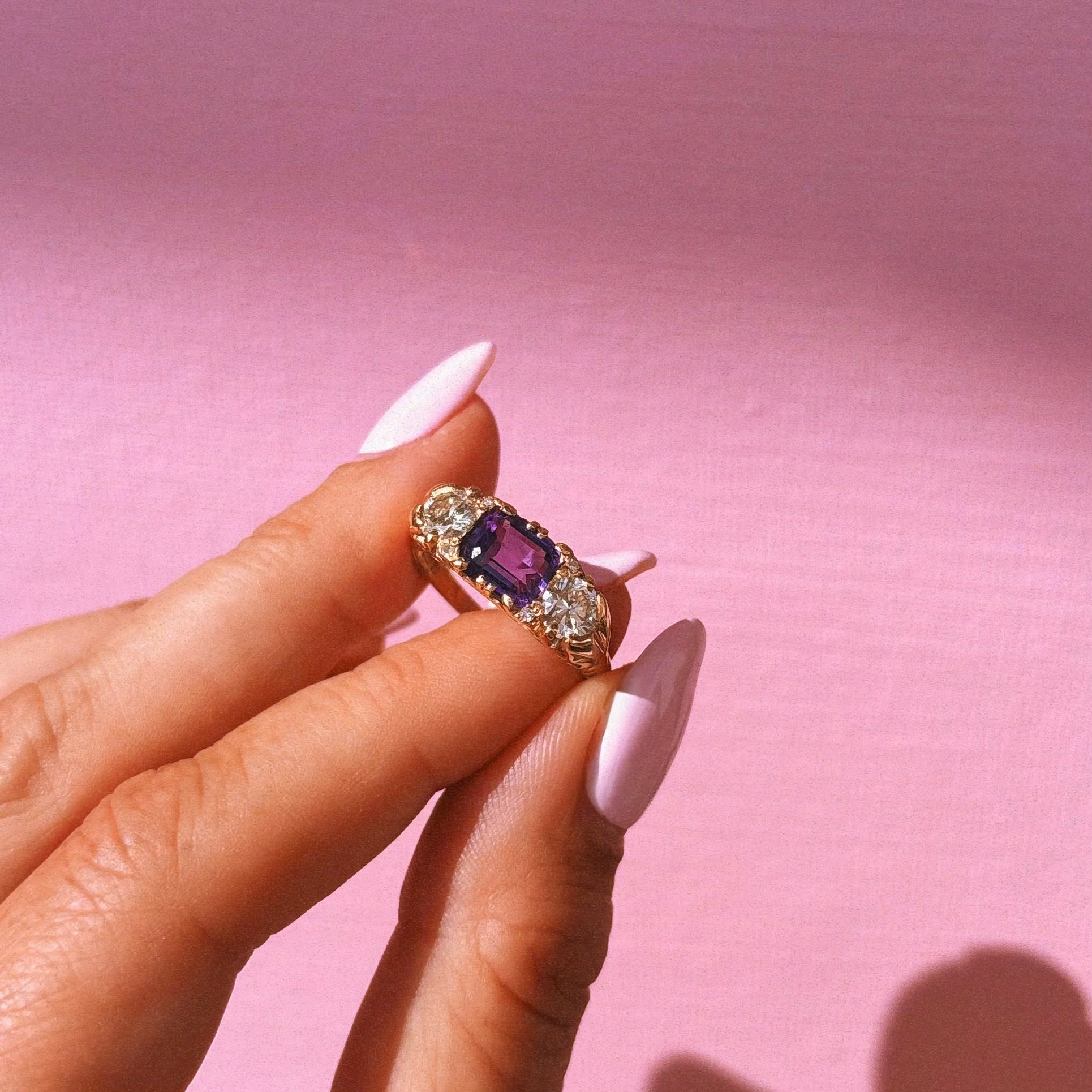 Vintage 18ct gold east to west amethyst and diamond carved ring