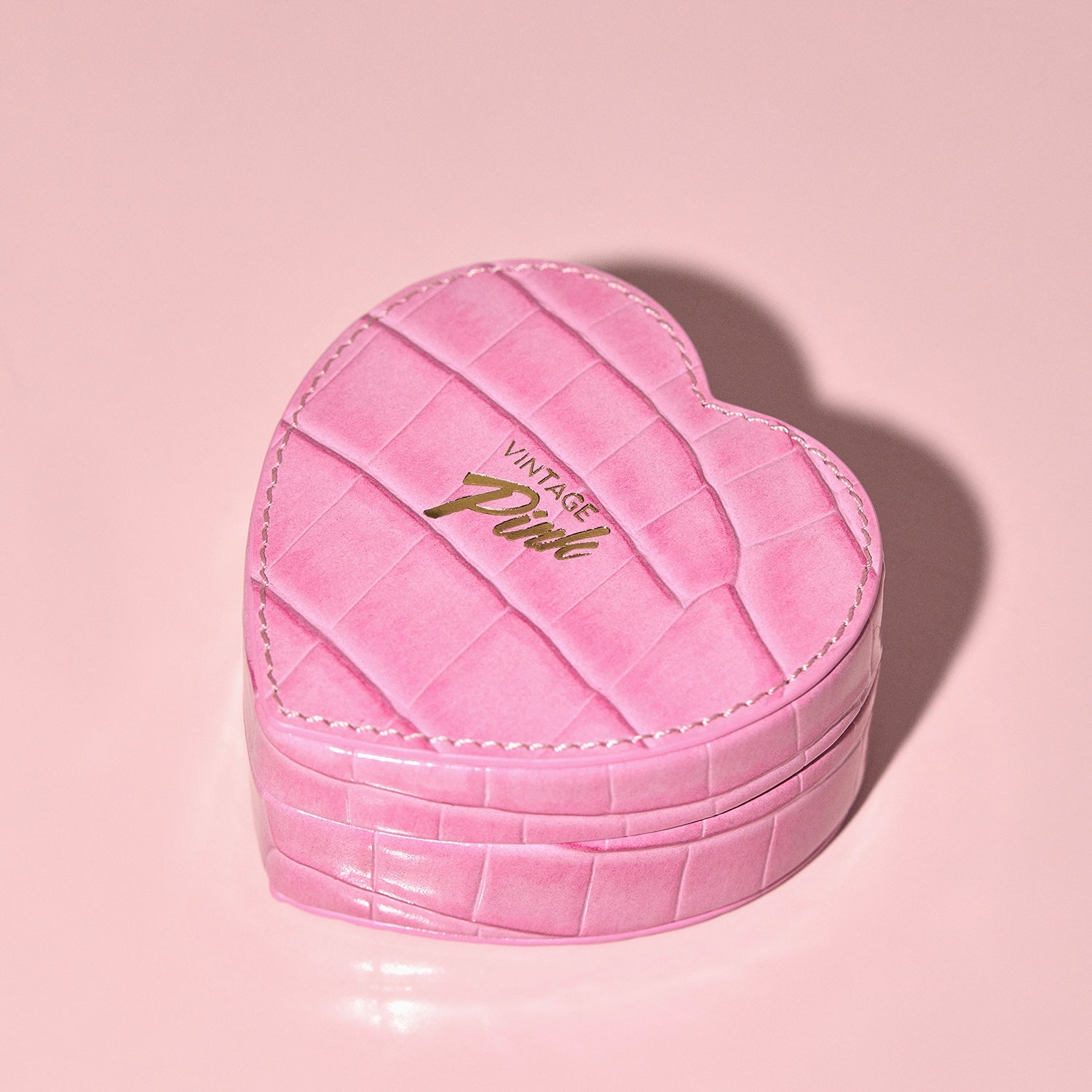 Heart-shaped pink faux croc and red velvet jewellery box
