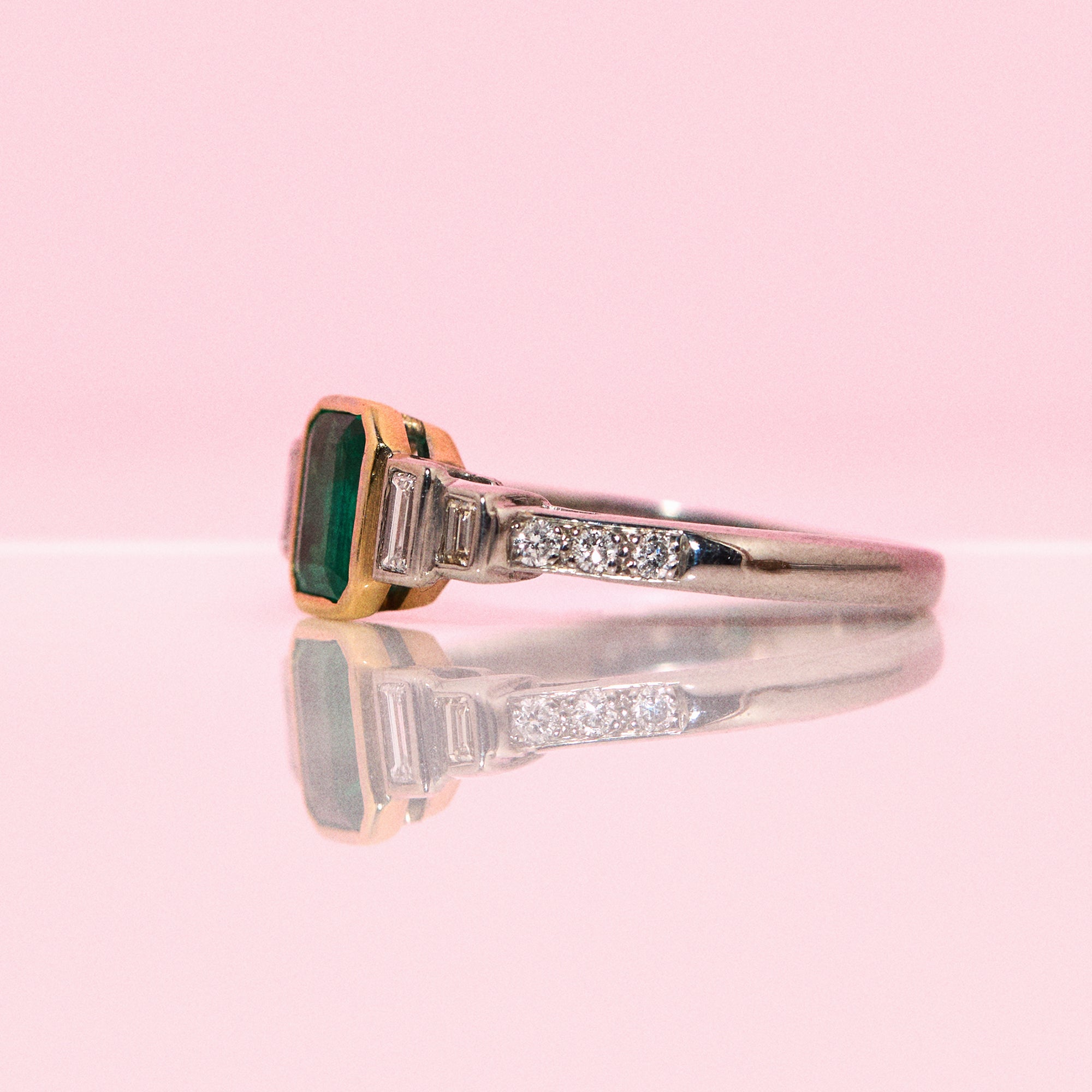 18ct white gold bezel set emerald and diamond ring