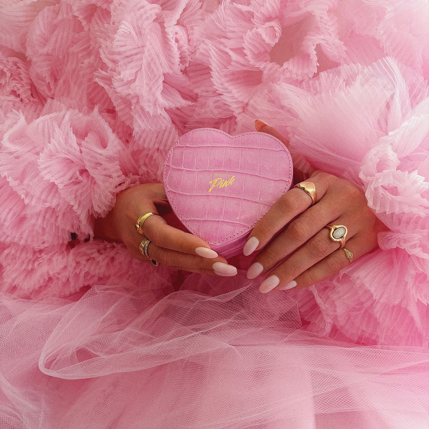 Heart-shaped pink faux croc and red velvet jewellery box