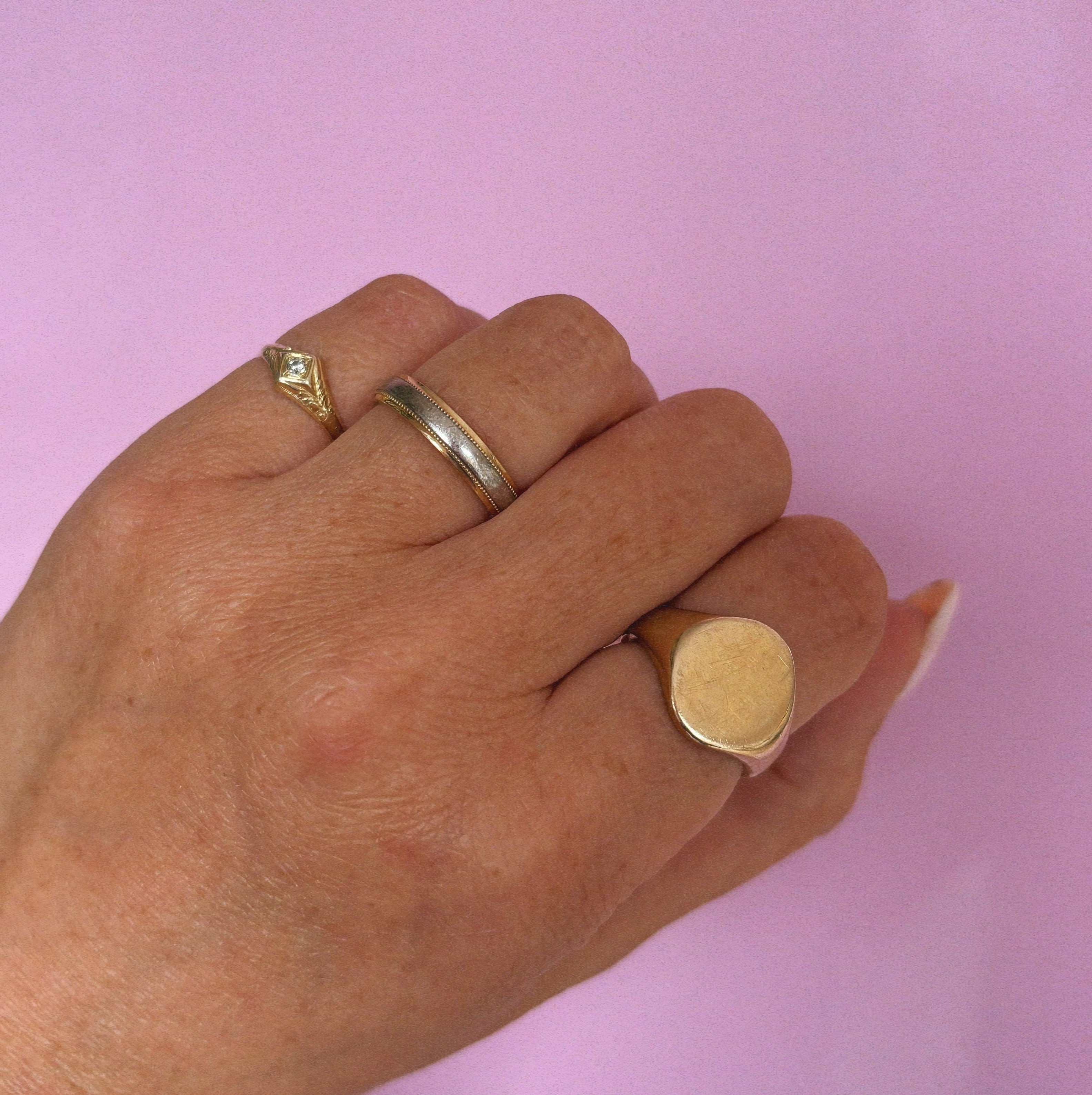 18ct gold two tone band with a beaded edge