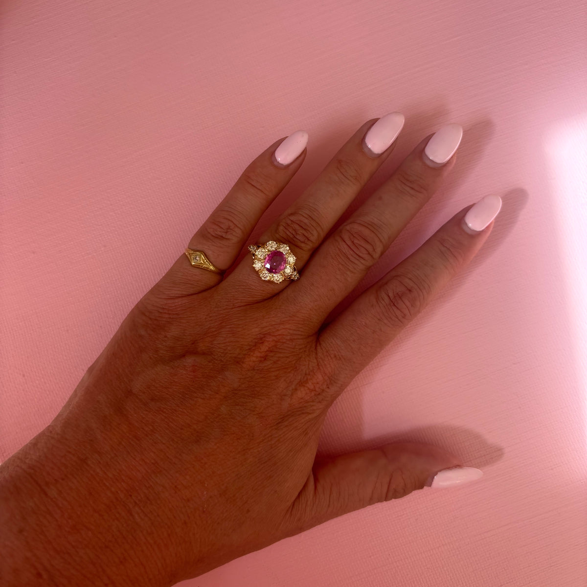 Vintage 18ct gold 1.16ct oval pink sapphire and 1.0ct diamond cluster ring