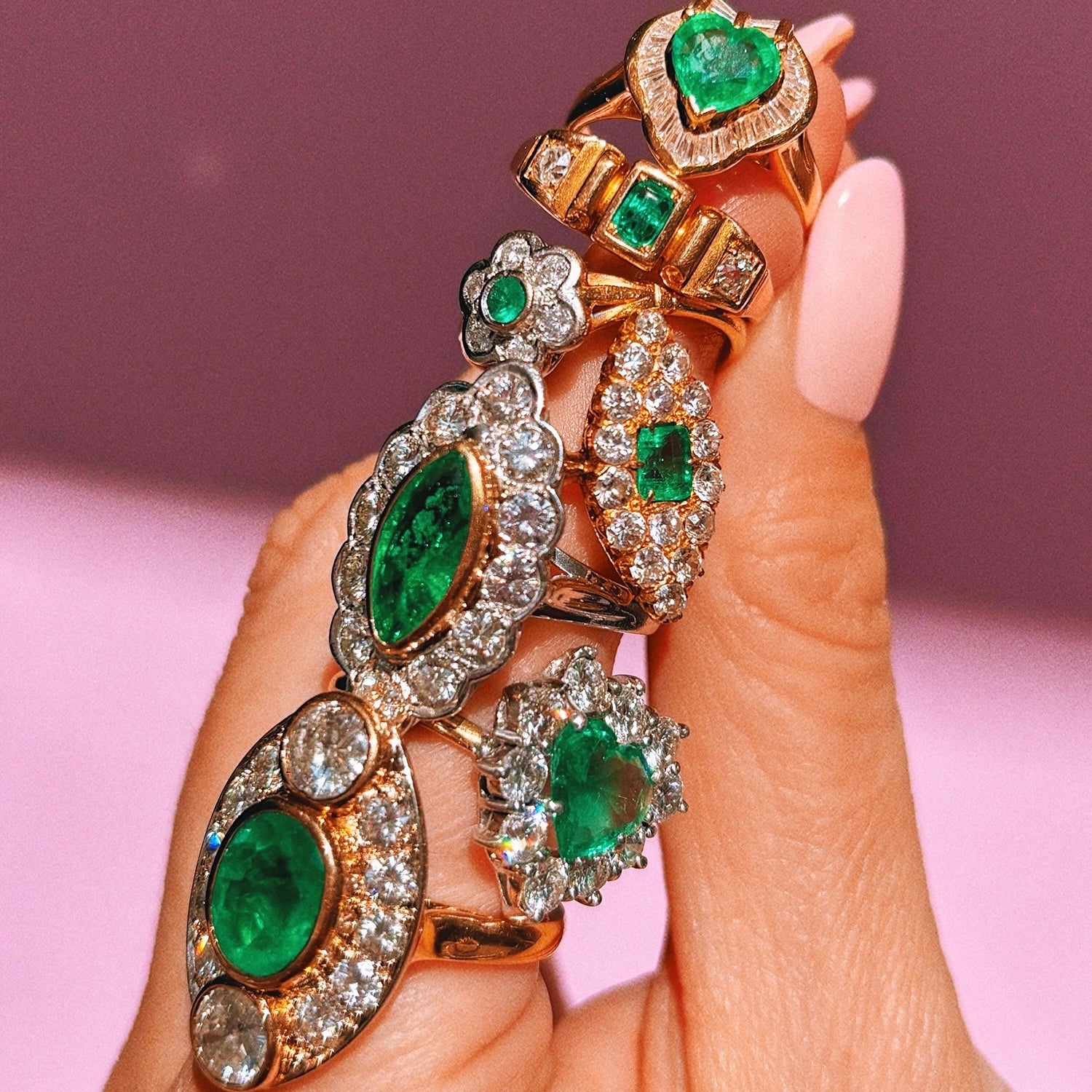 18ct gold heart shaped emerald and baguette diamond ring