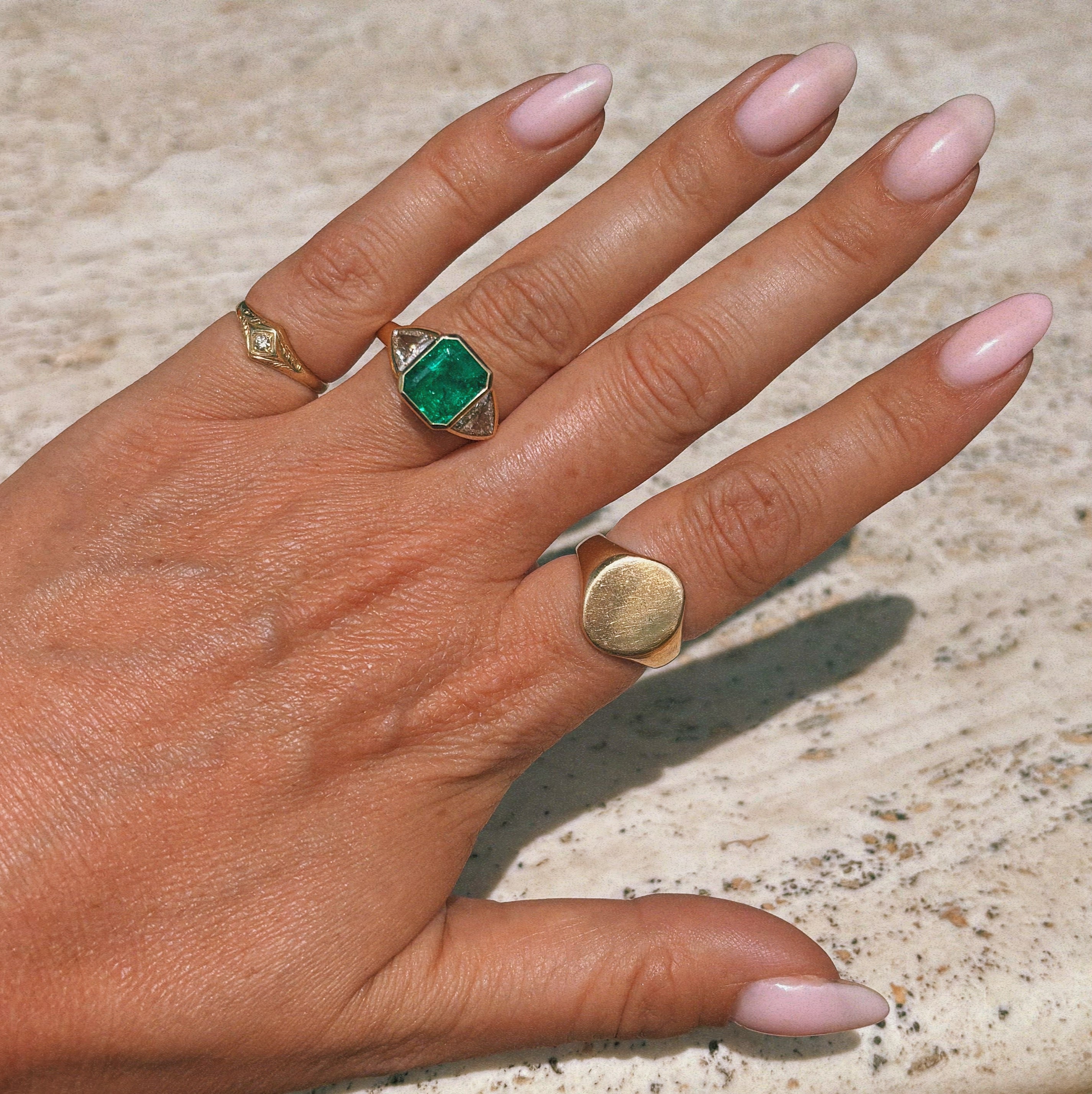 18ct gold 3.0ct Columbian Octagonal-cut emerald and 1.0ct diamond bezel set ring