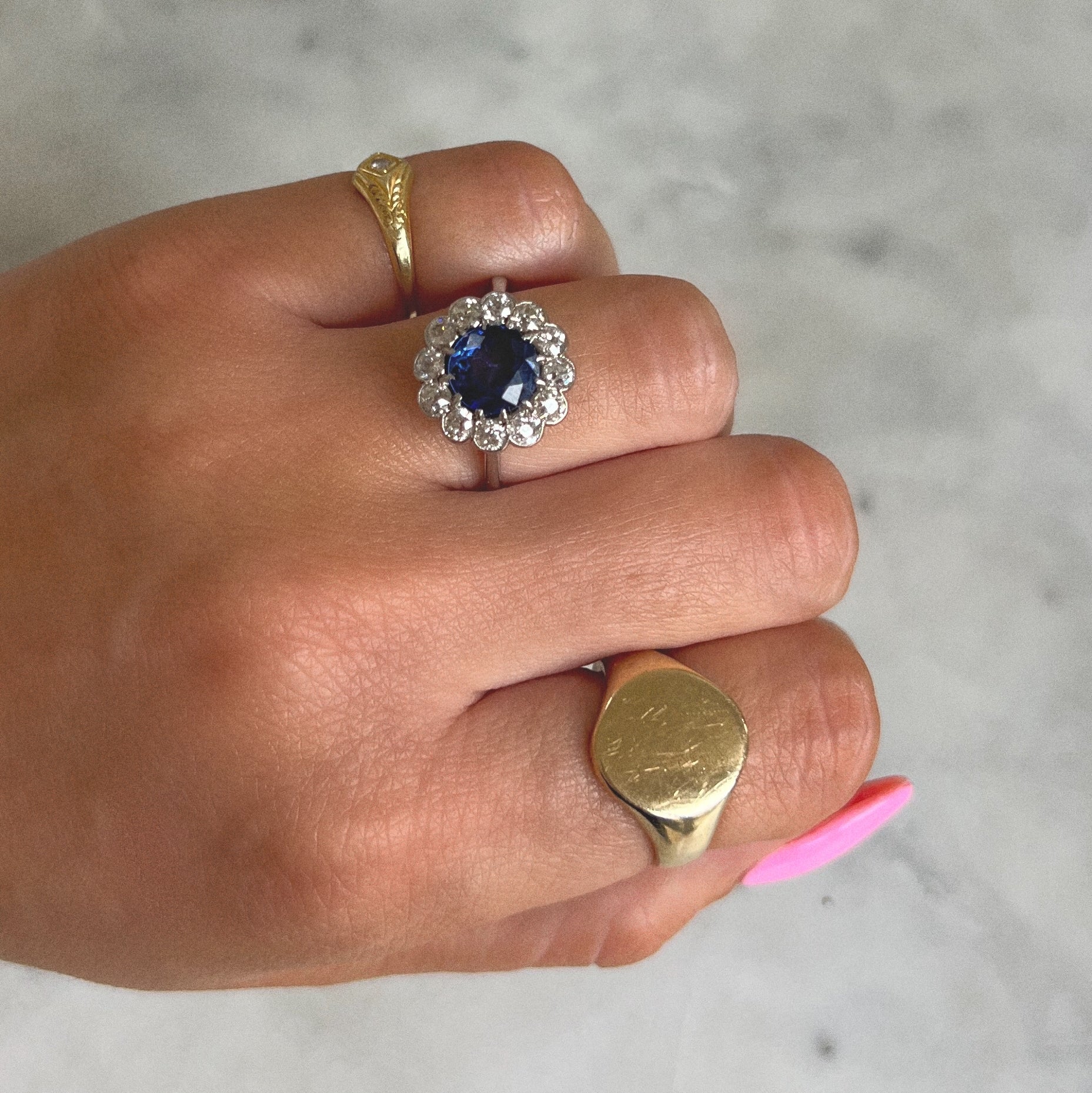 Platinum ring with a sapphire and diamonds