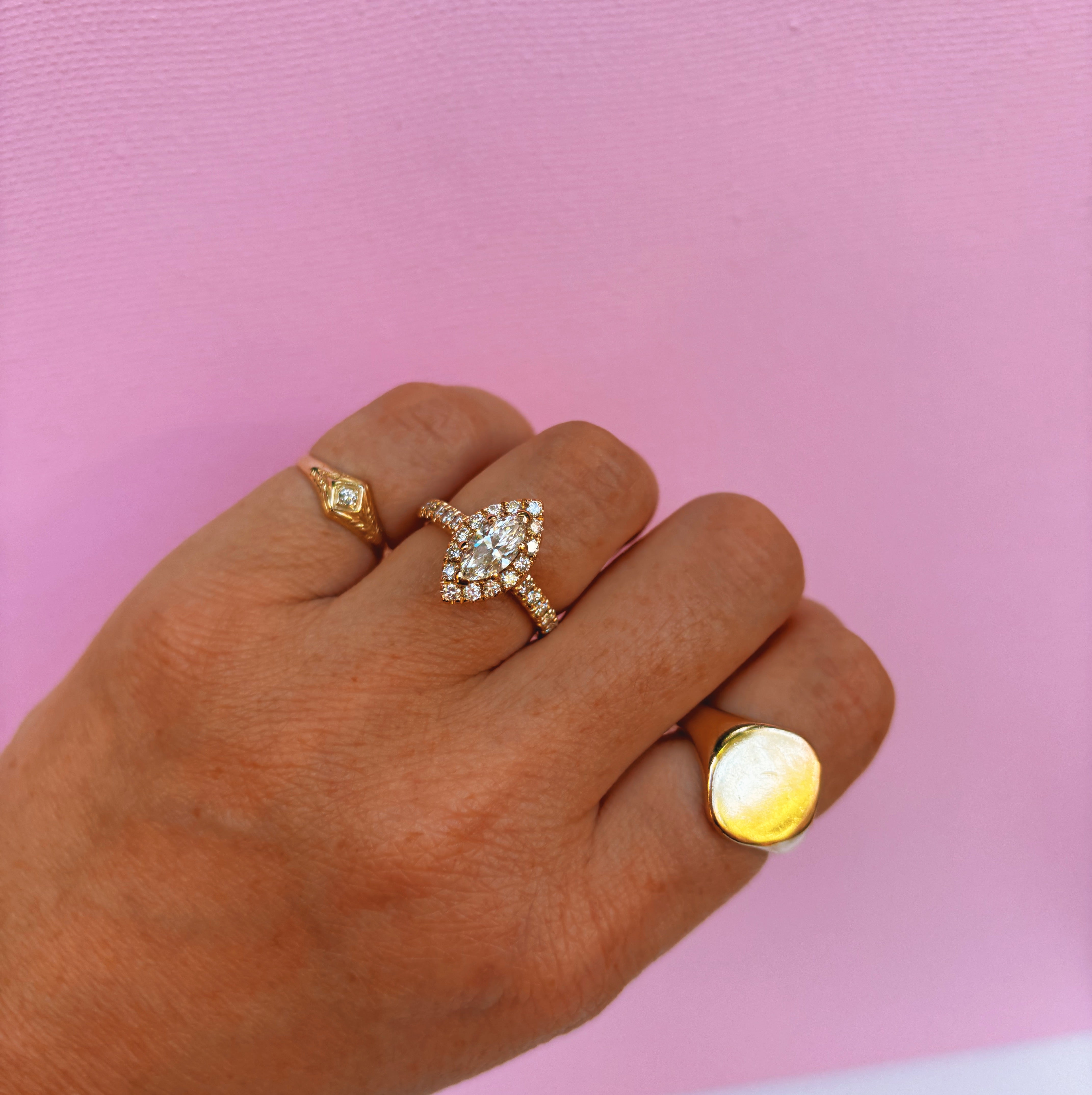 18ct gold 0.85ct marquise cut diamond halo ring