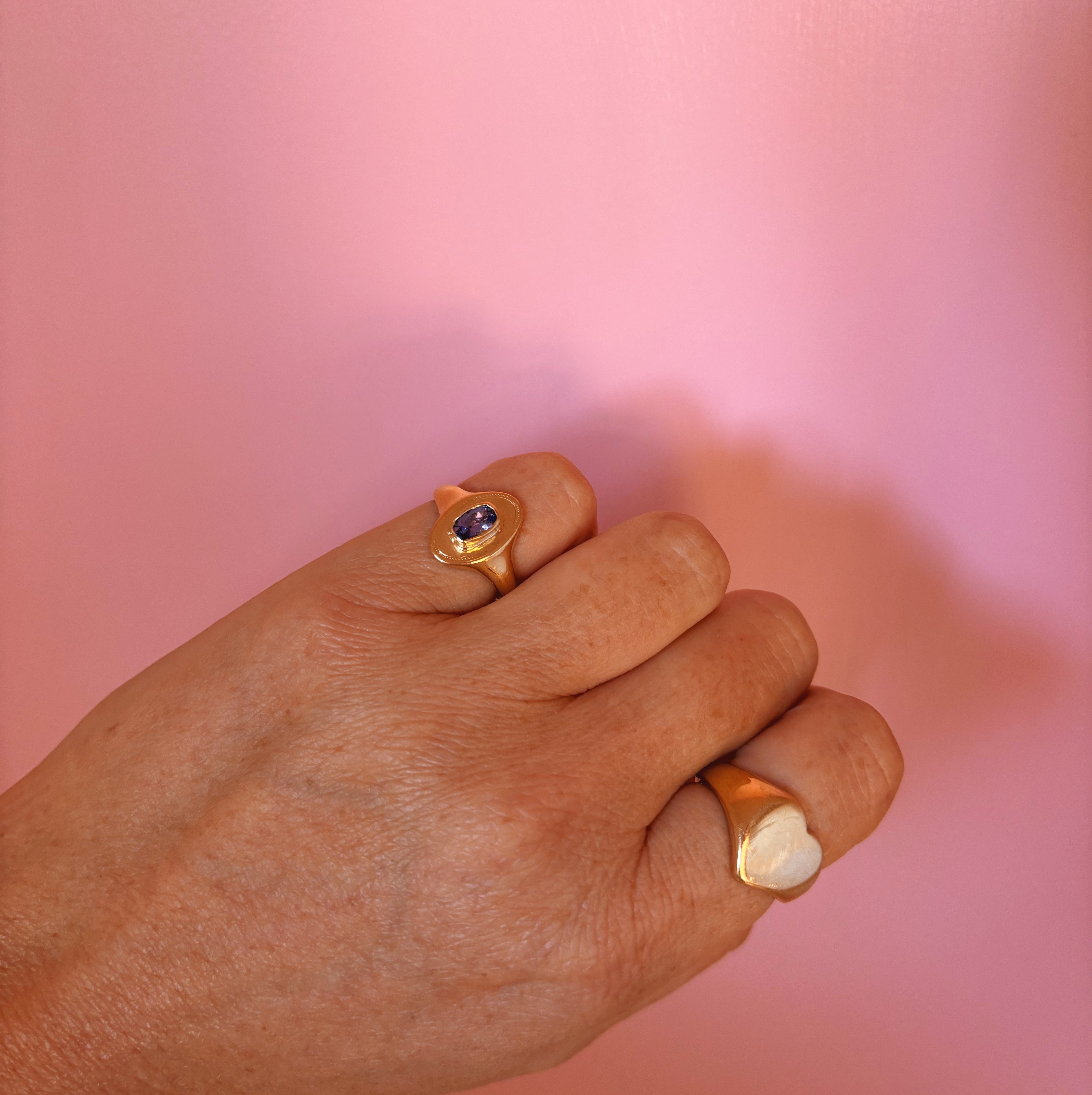 18ct gold tanzanite oval signet ring