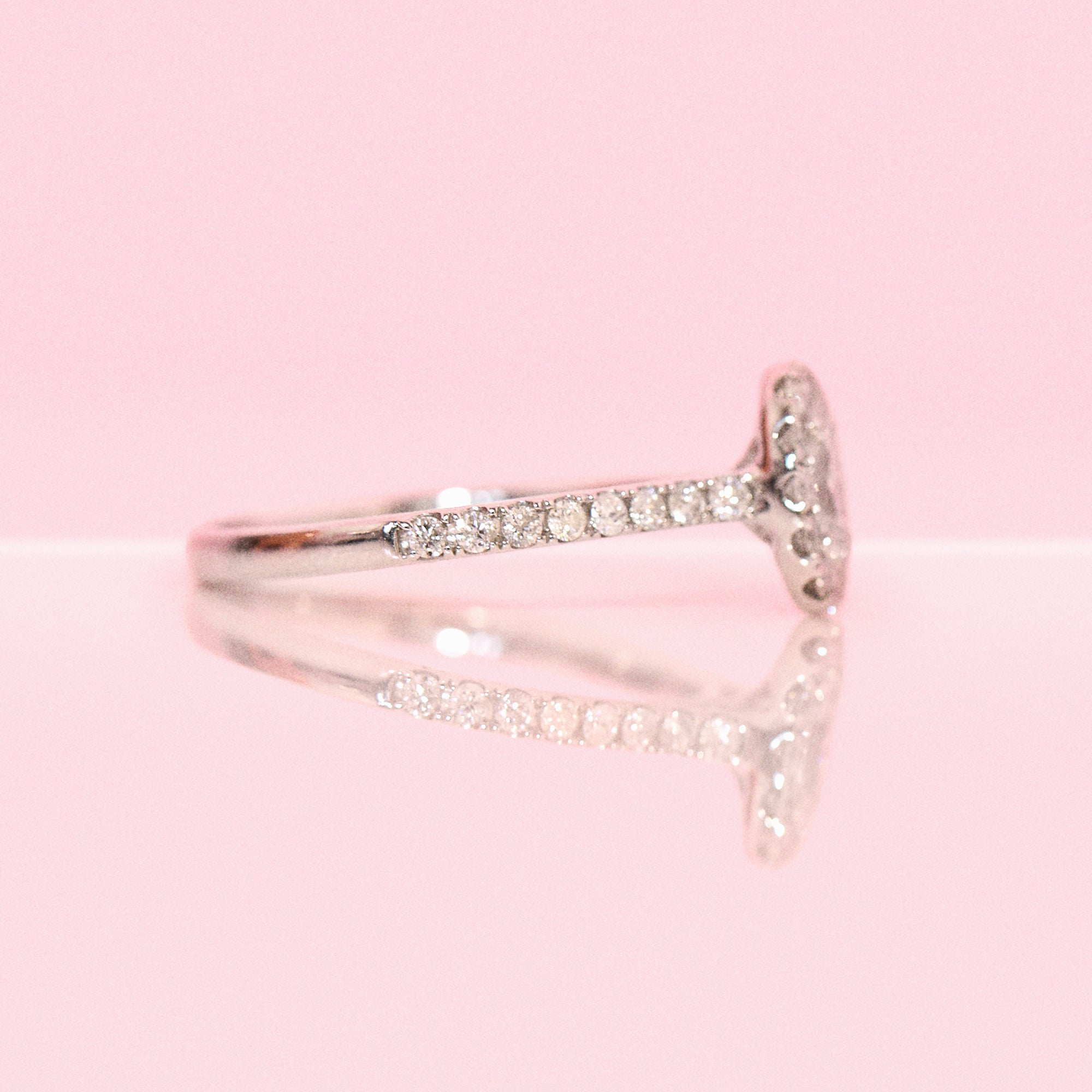 Platinum 0.62ct oval half-eternity diamond ring