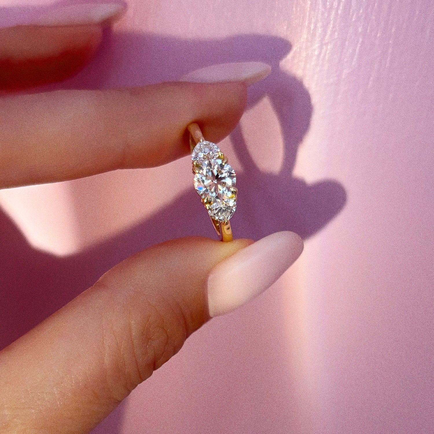 18ct gold 0.90ct round cut centre and two heart shaped diamond ‘Hidden Hearts’ ring