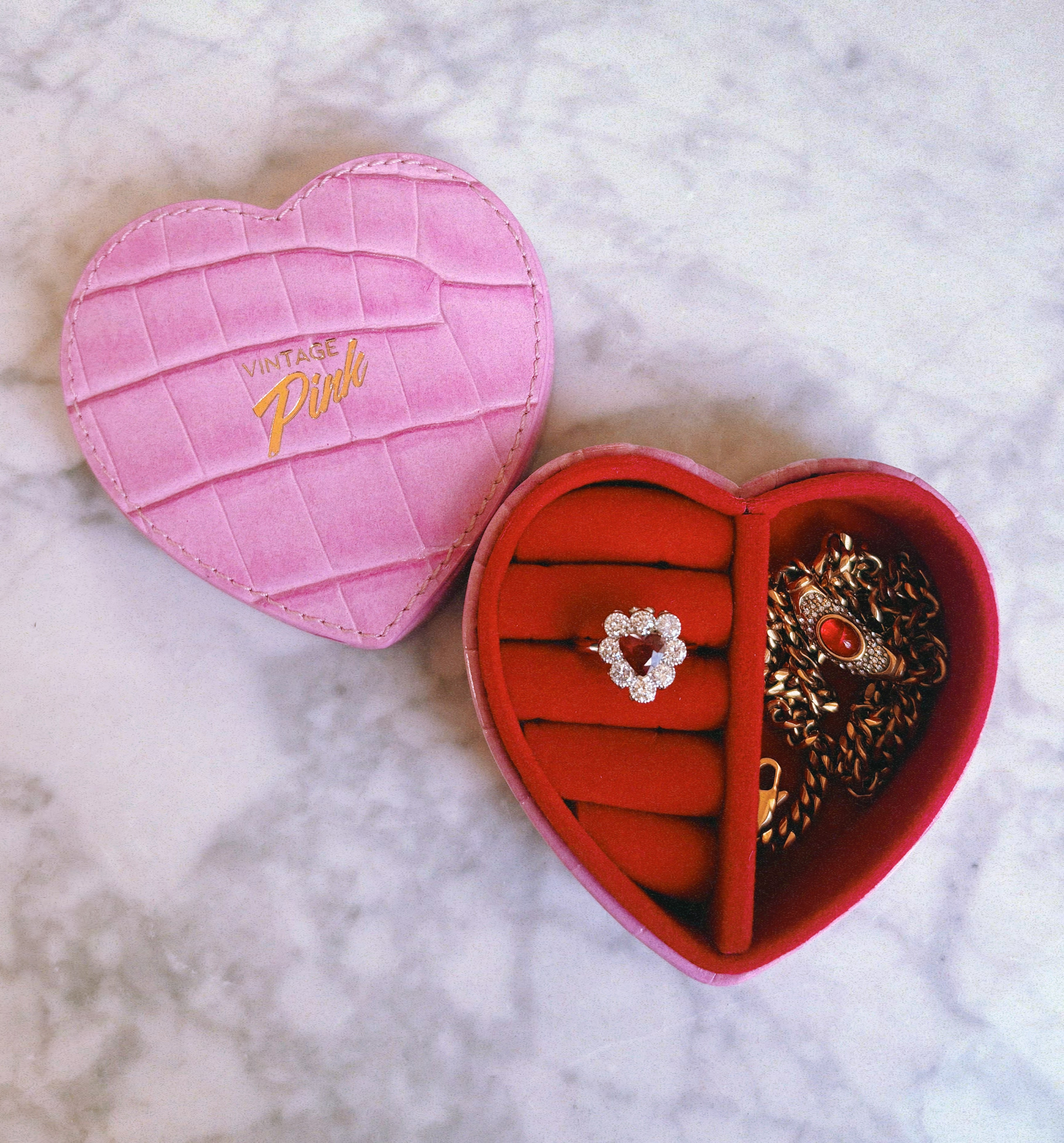 Platinum heart-shaped ruby and diamond vintage earring conversion ring