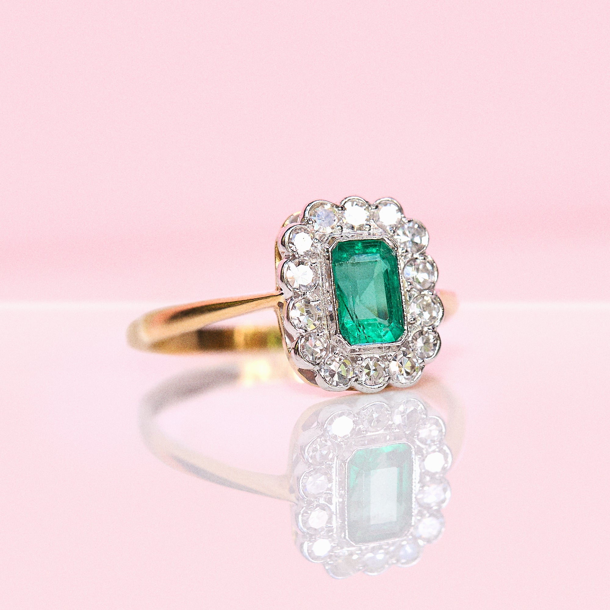18ct gold emerald and diamond cluster ring