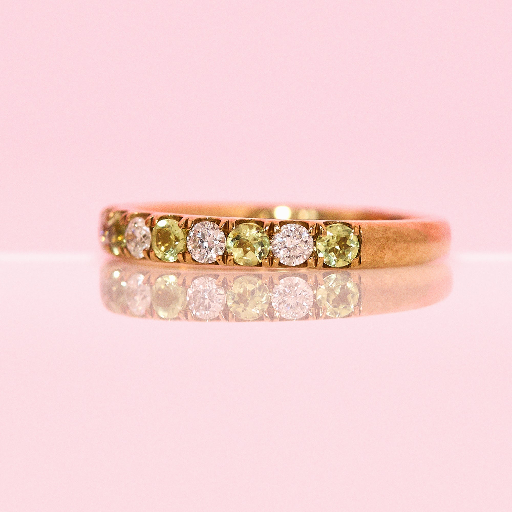 9ct gold 0.43ct peridot and 0.30ct diamond half-eternity ring